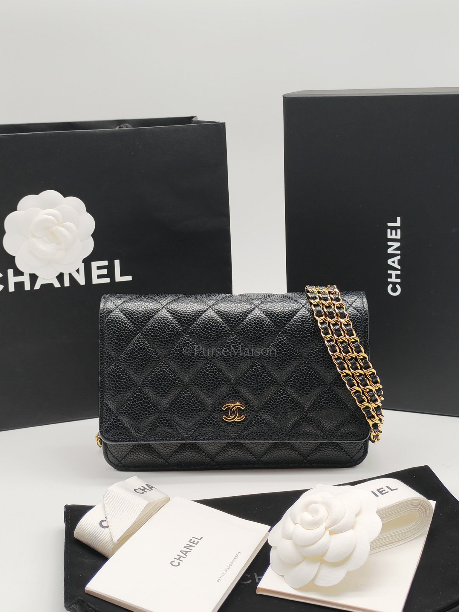 Wallet On Chain (WOC) in Black Quilted Caviar Leather and Gold Hardware Microchip