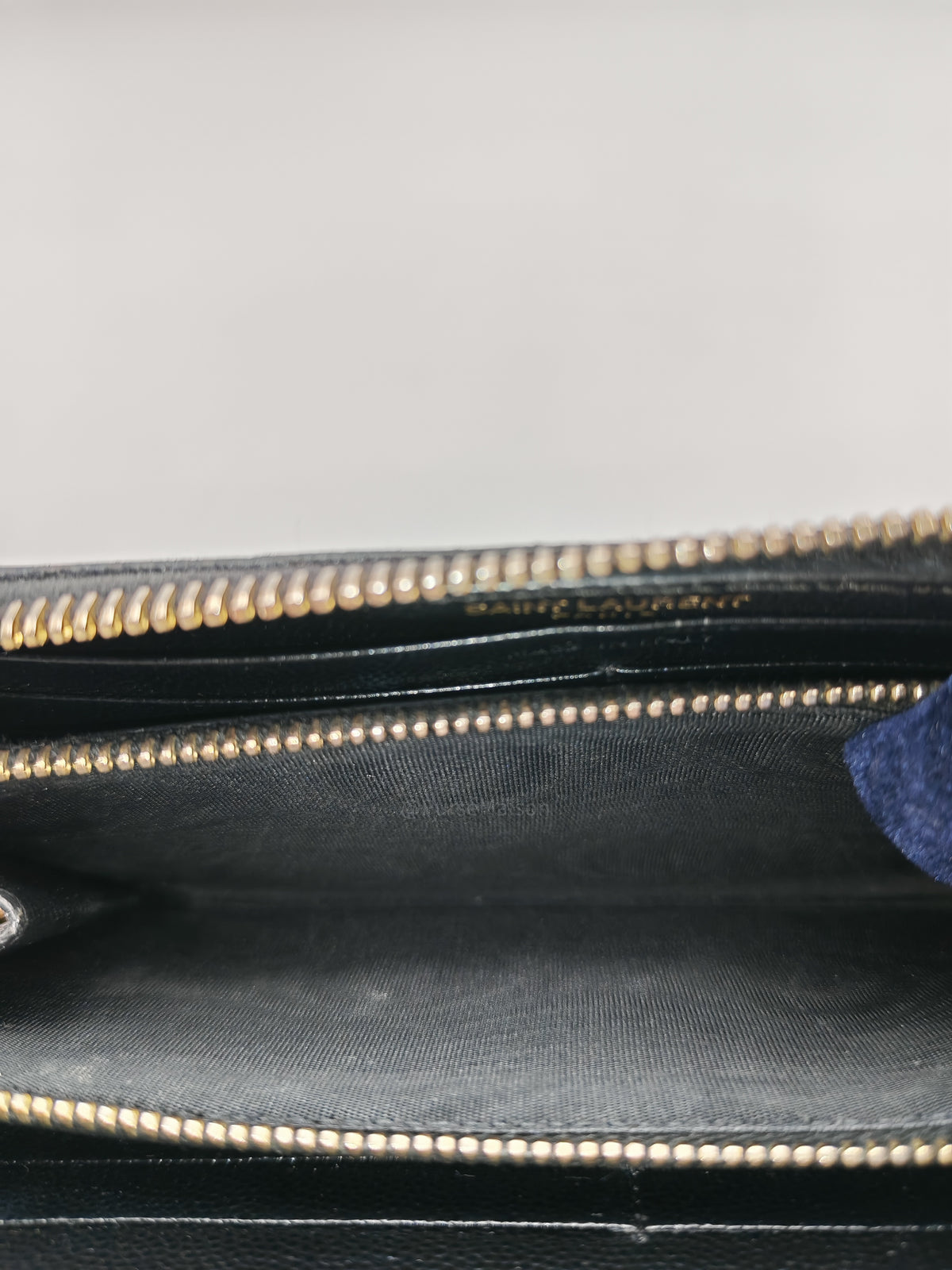 Yves Saint Laurent Cassandre Zip-Around Wallet in Black Chevron Quilted Matelasse Grained de Poudre Leather and Gold Hardware | Purse Maison Luxury Bags Shop