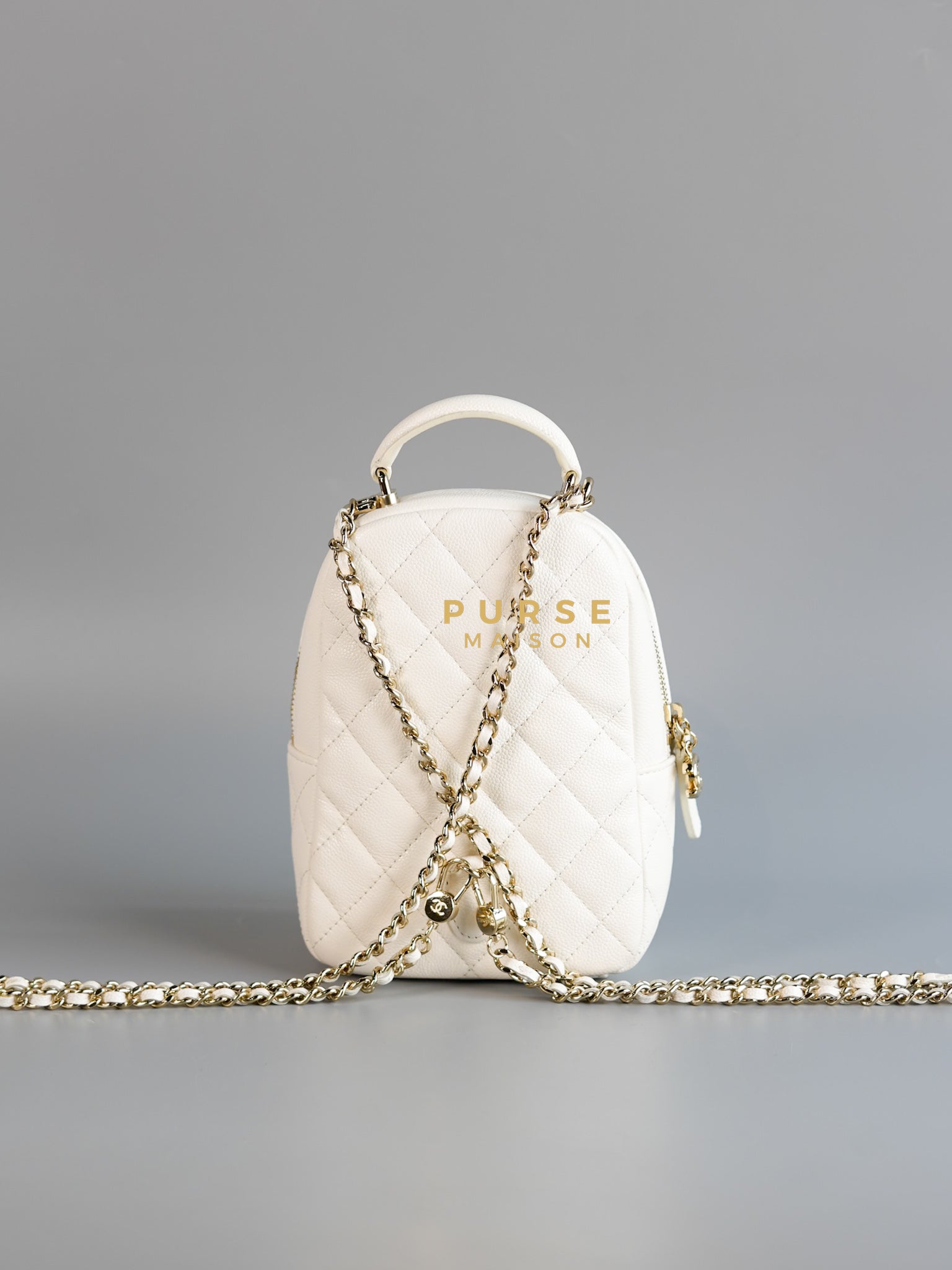 2024 Cruise Mini Backpack in White Caviar and Light Gold Hardware (Microchip) | Purse Maison Luxury Bags Shop