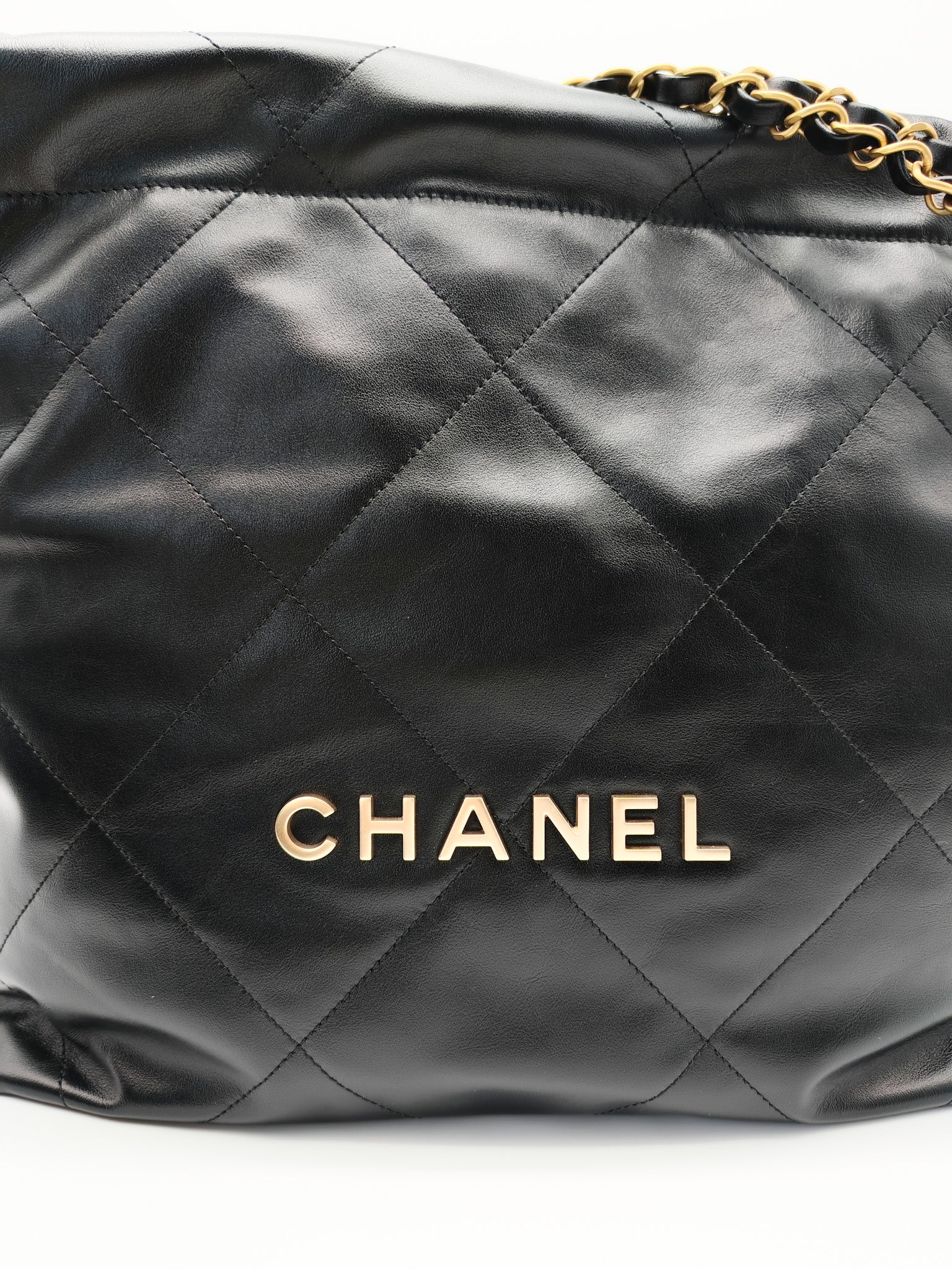 22 Small in Black Quilted Shiny Calfskin Leather and Aged Gold Hardware (Microchip) | Purse Maison Luxury Bags Shop