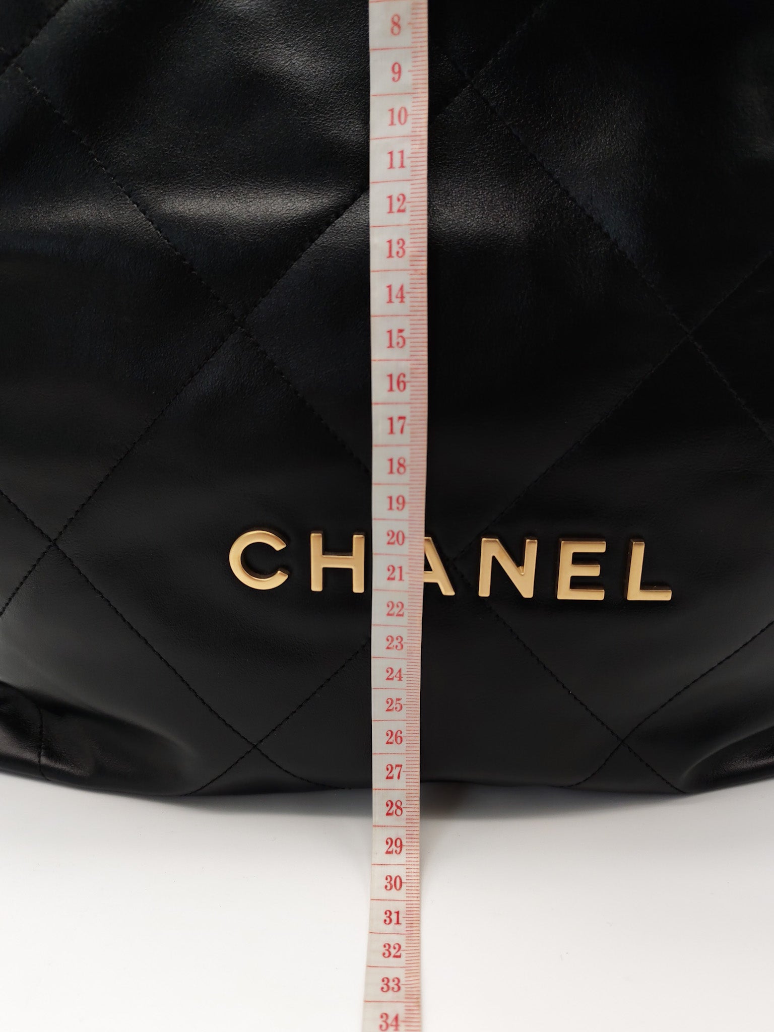 22 Small in Black Quilted Shiny Calfskin Leather and Aged Gold Hardware (Microchip) | Purse Maison Luxury Bags Shop