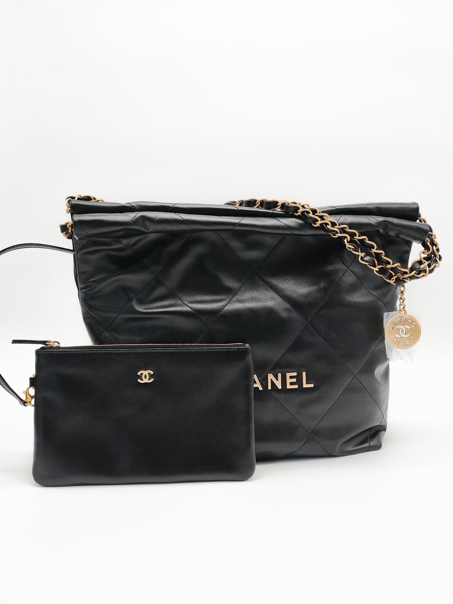 22 Small in Black Quilted Shiny Calfskin Leather and Aged Gold Hardware (Microchip) | Purse Maison Luxury Bags Shop