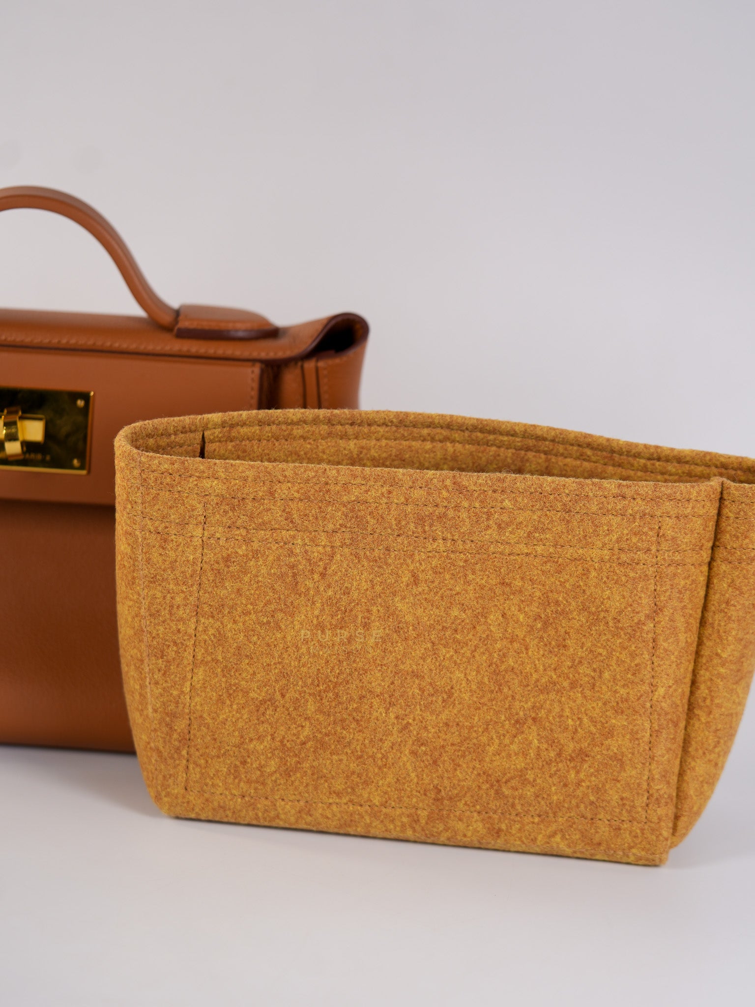 24/24 21 Gold Evercolor Leather in Gold Hardware Stamp U (2022) | Purse Maison Luxury Bags Shop