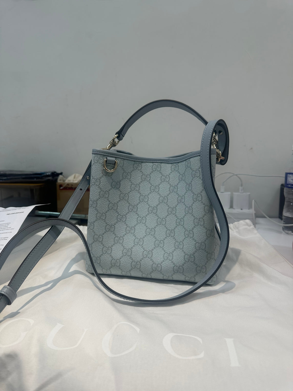 Gucci gg emblem small bucket bag