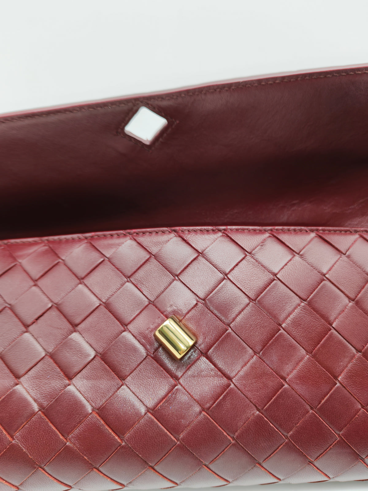 Bottega Veneta Andiamo Clutch in Barolo Woven Intrecciato Lambskin Leather and Gold Hardware