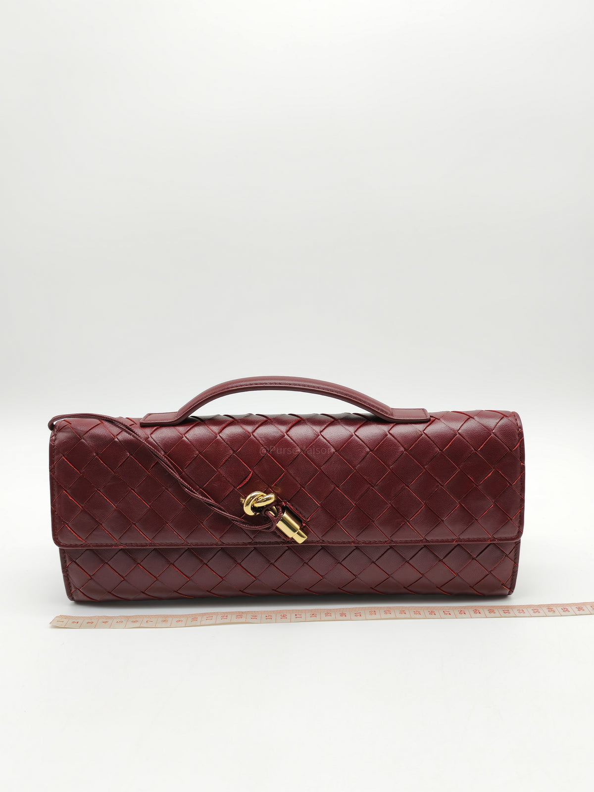 Bottega Veneta Andiamo Clutch in Barolo Woven Intrecciato Lambskin Leather and Gold Hardware