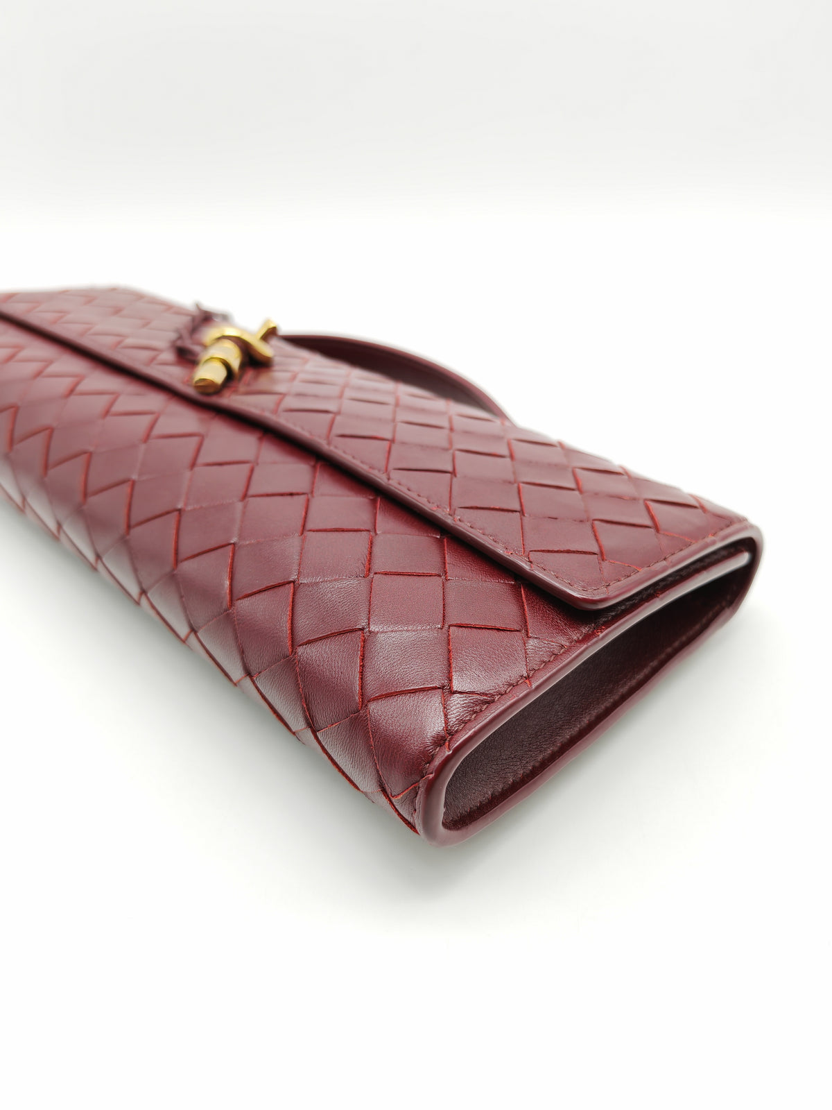 Bottega Veneta Andiamo Clutch in Barolo Woven Intrecciato Lambskin Leather and Gold Hardware