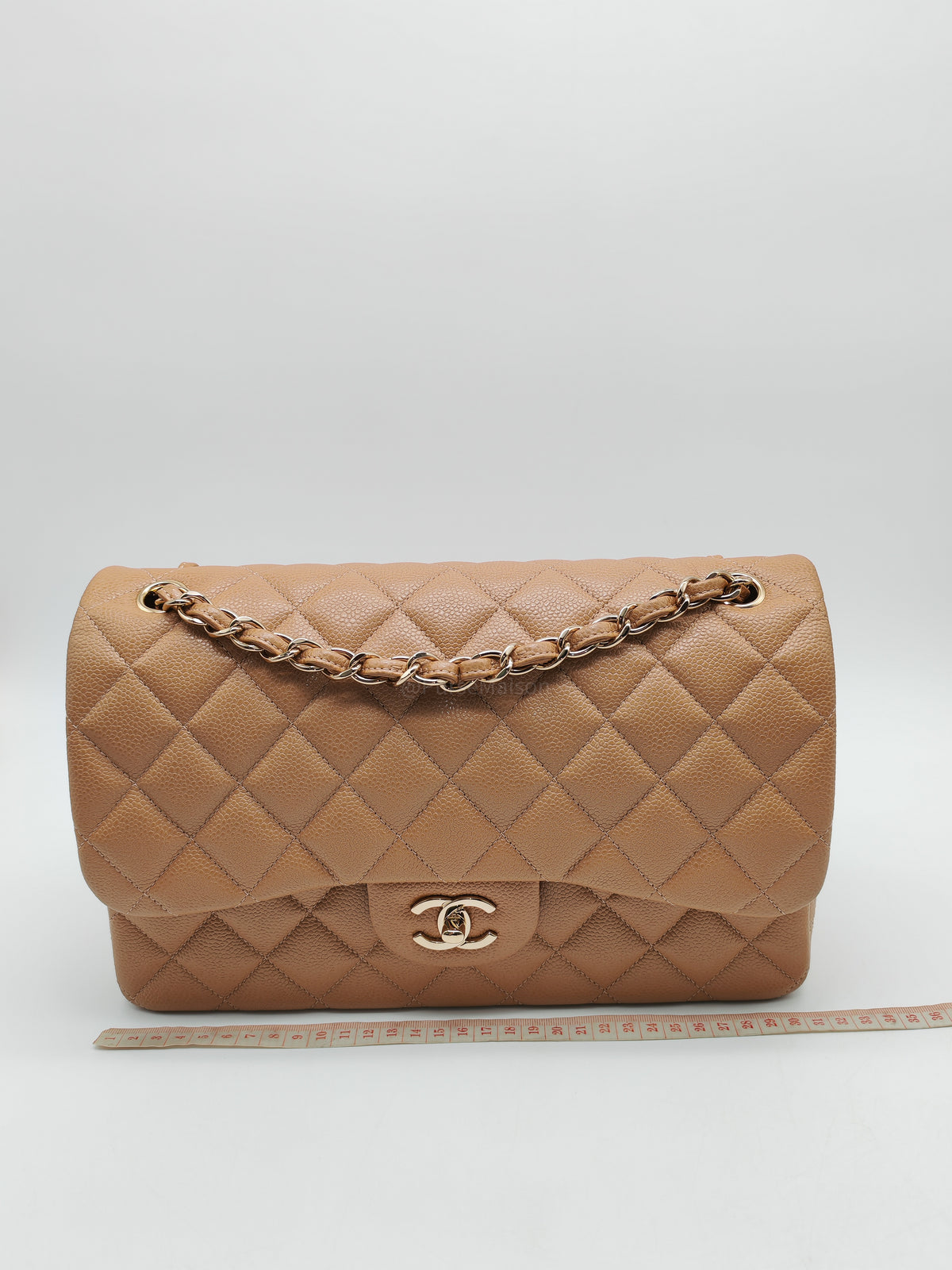 Chanel Classic Double Flap Jumbo in Dark Beige Caviar Leather and Light Gold Hardware (Series 25)