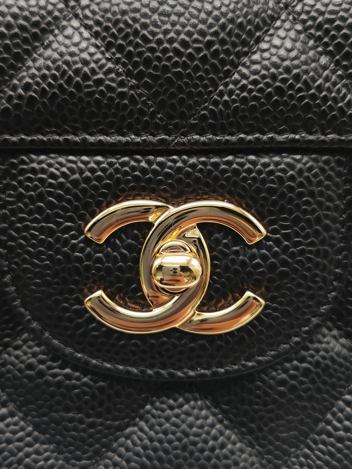 Chanel Classic Double Flap Jumbo in Black Quilted Caviar Leather and Gold Hardware Series 27