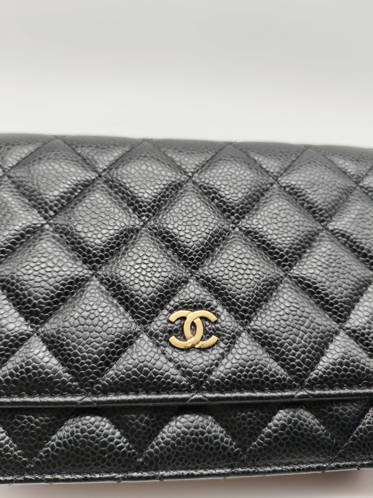 Chanel Wallet on Chain (WOC) in Black Quilted Caviar Leather and Gold Hardware Series 29
