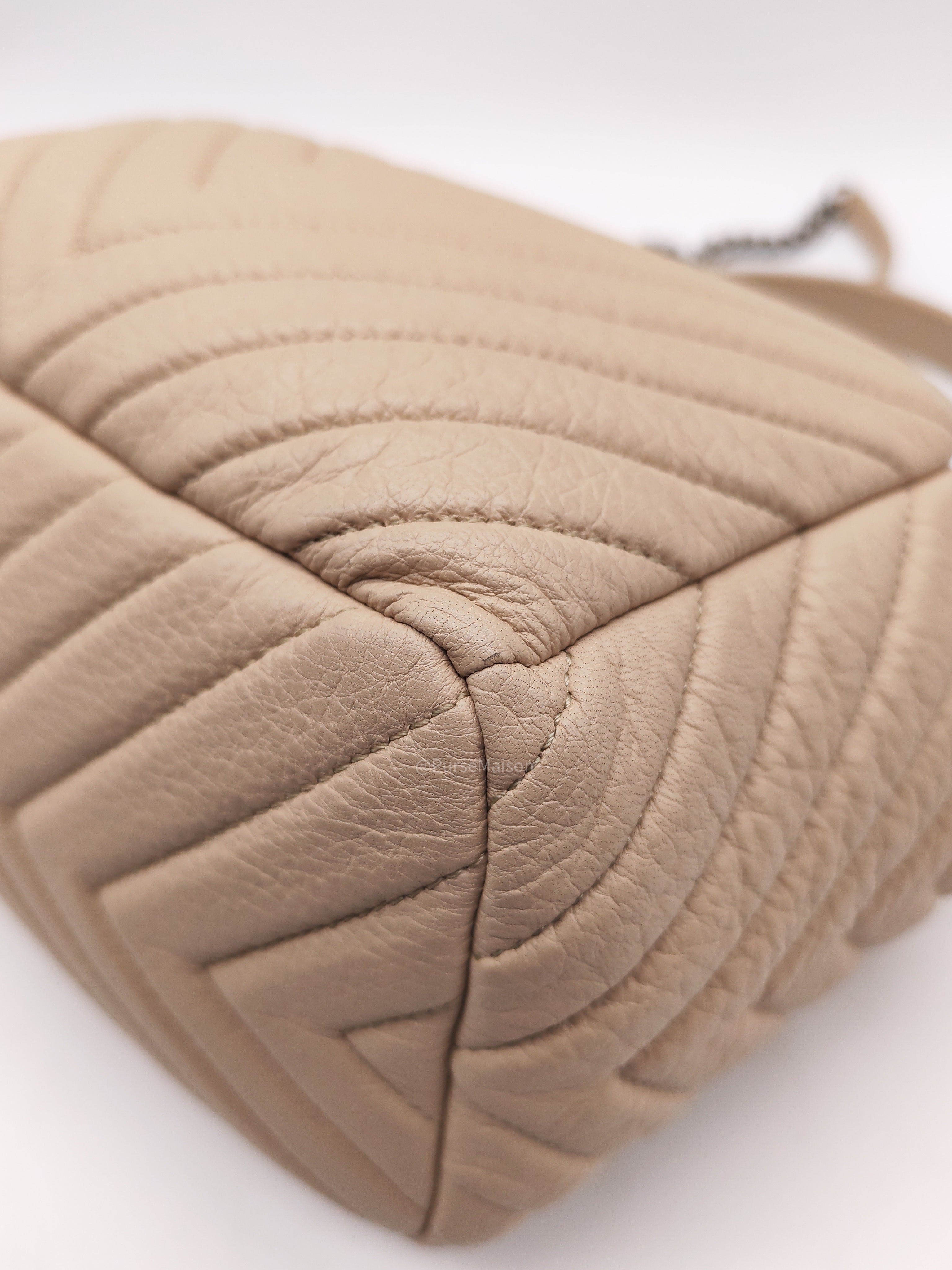 Chanel Chevron Drawstring Bucket Bag in Beige Calfskin Leather and Silver Hardware Series 23