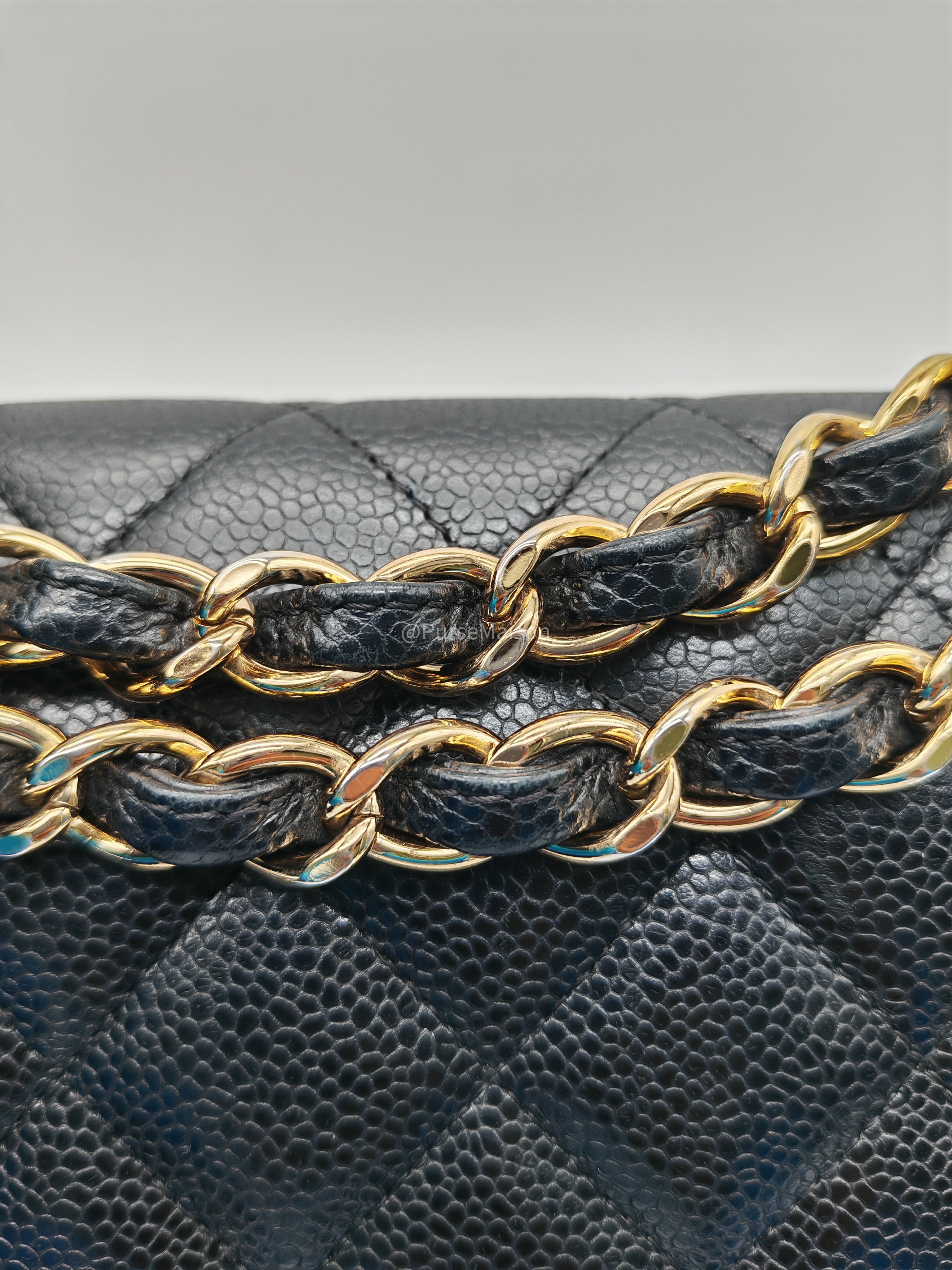 Chanel Classic Doube Flap Jumbo in Black Quilted Caviar Leather and Gold Hardware Series 16