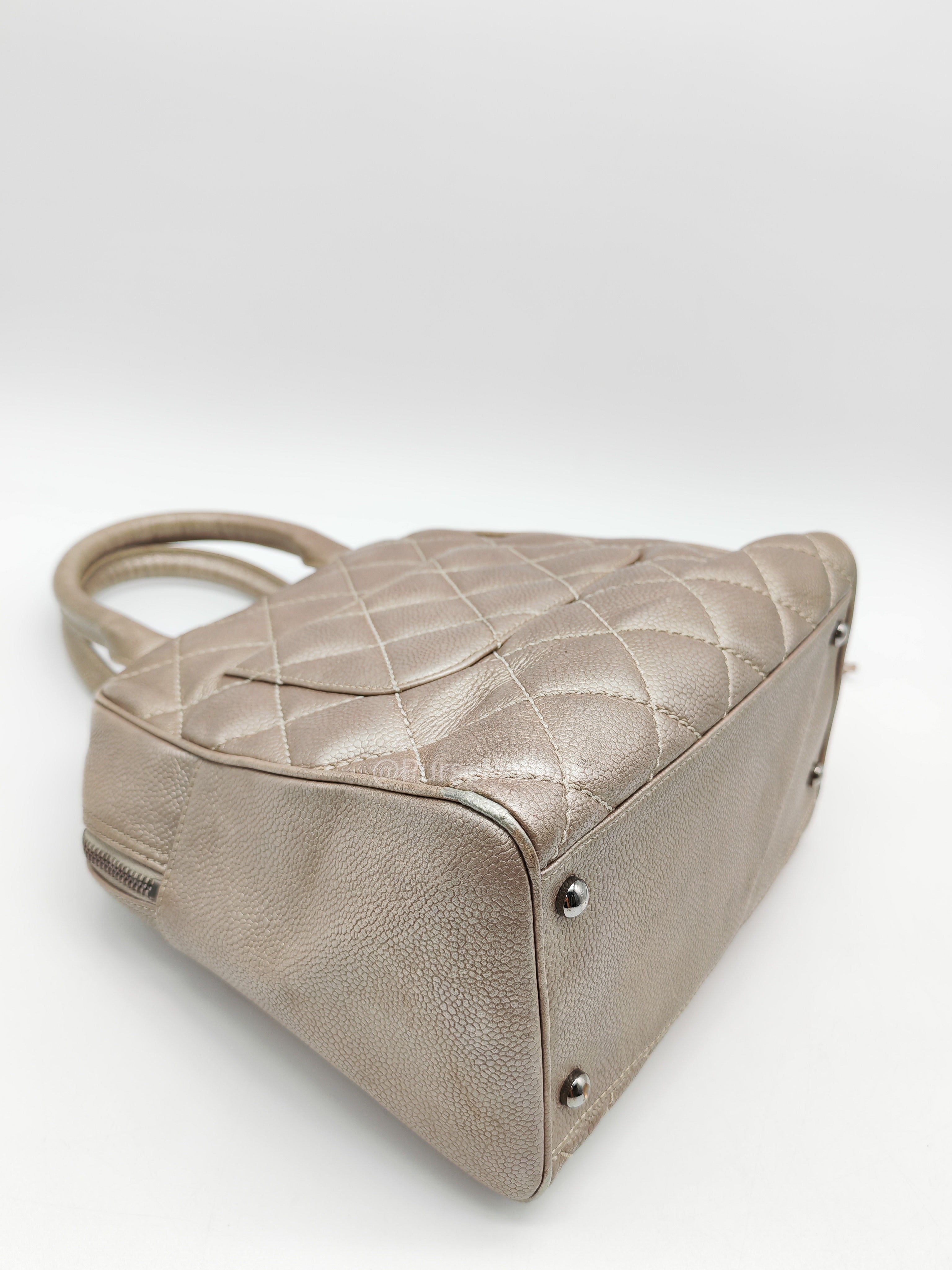 Chanel Tassel Top Handle Bag in Metallic Quilted Caviar Leather Silver Hardware (Series 9)