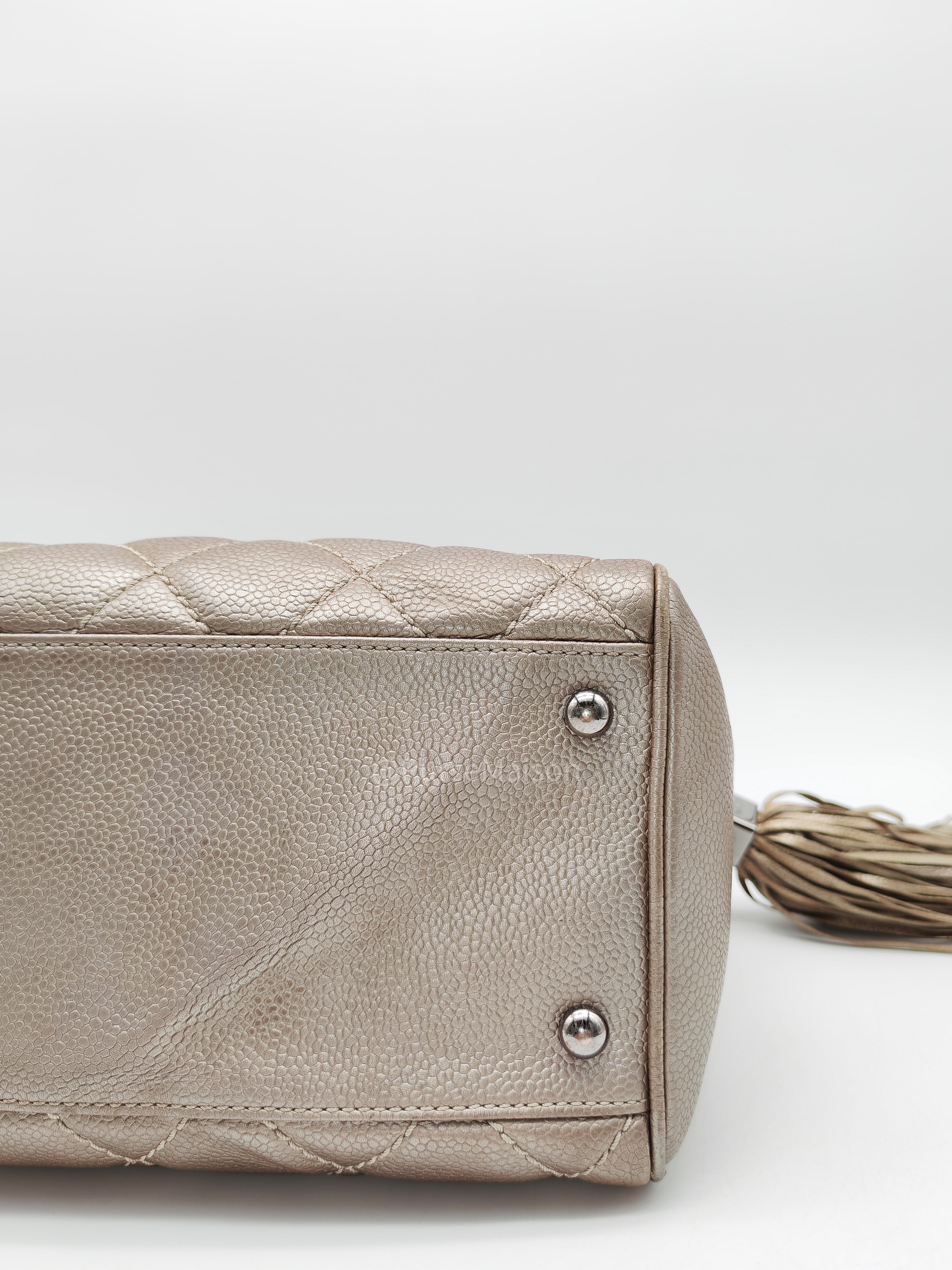 Chanel Tassel Top Handle Bag in Metallic Quilted Caviar Leather Silver Hardware (Series 9)