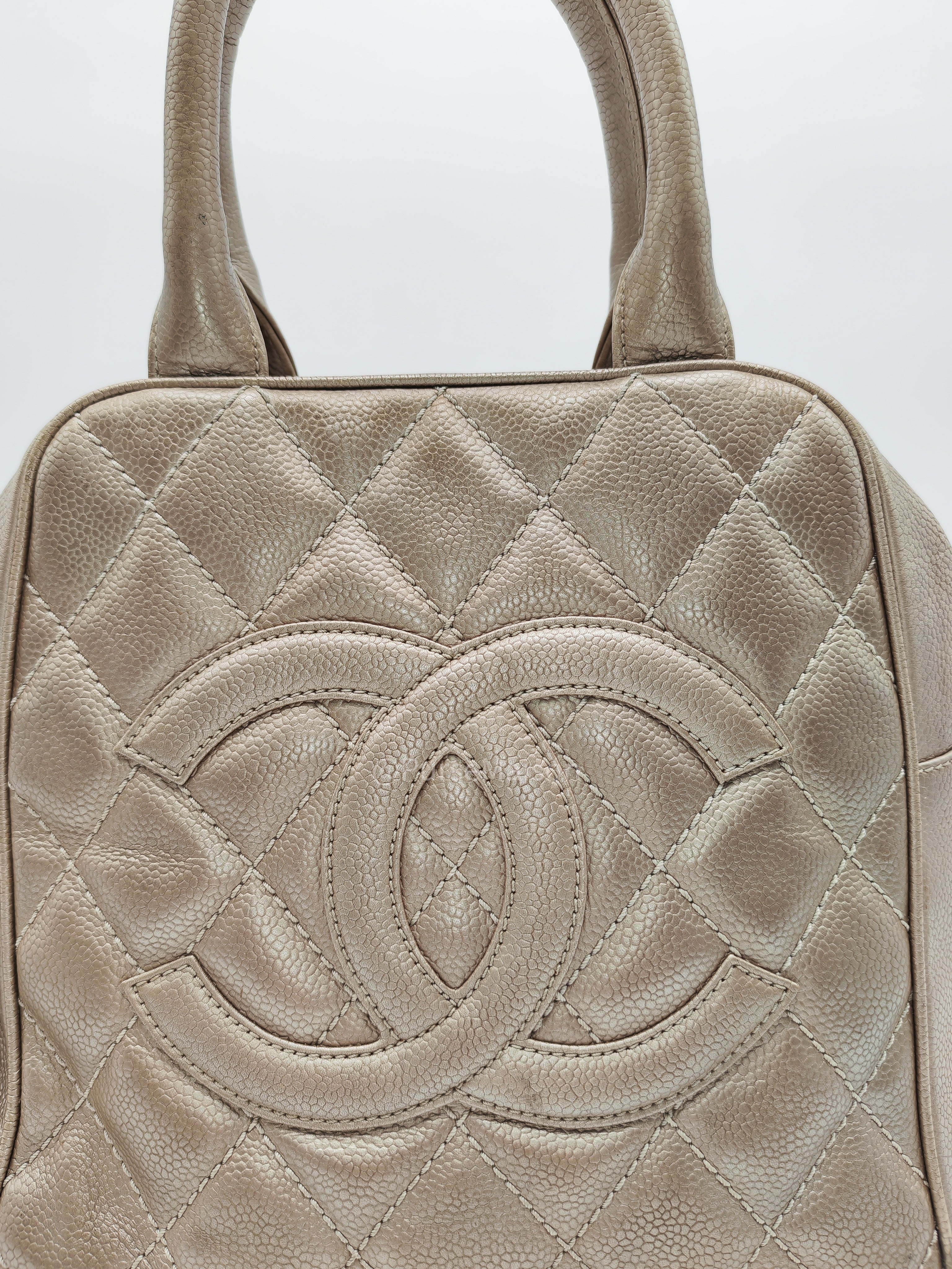 Chanel Tassel Top Handle Bag in Metallic Quilted Caviar Leather Silver Hardware (Series 9)
