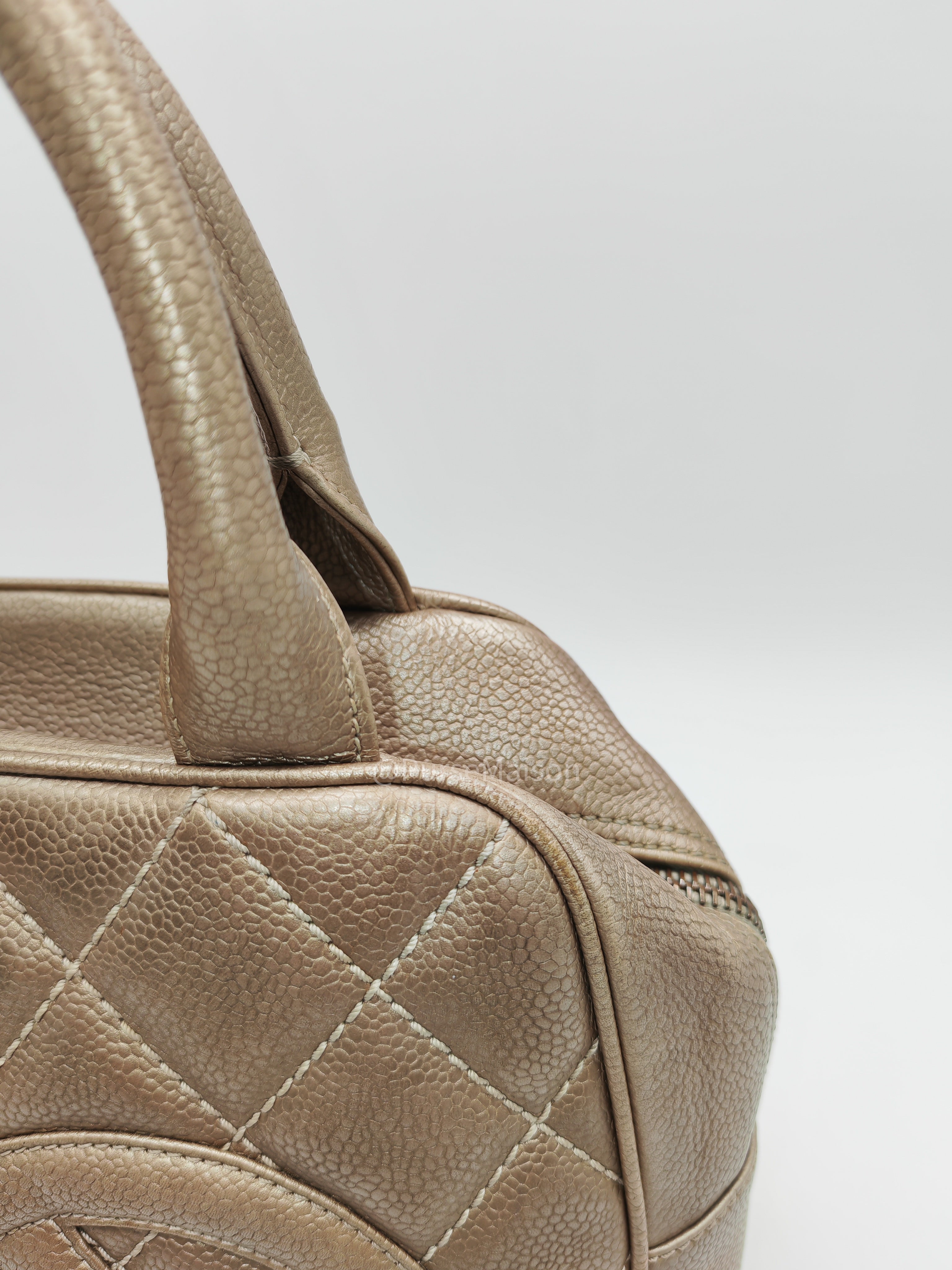Chanel Tassel Top Handle Bag in Metallic Quilted Caviar Leather Silver Hardware (Series 9)