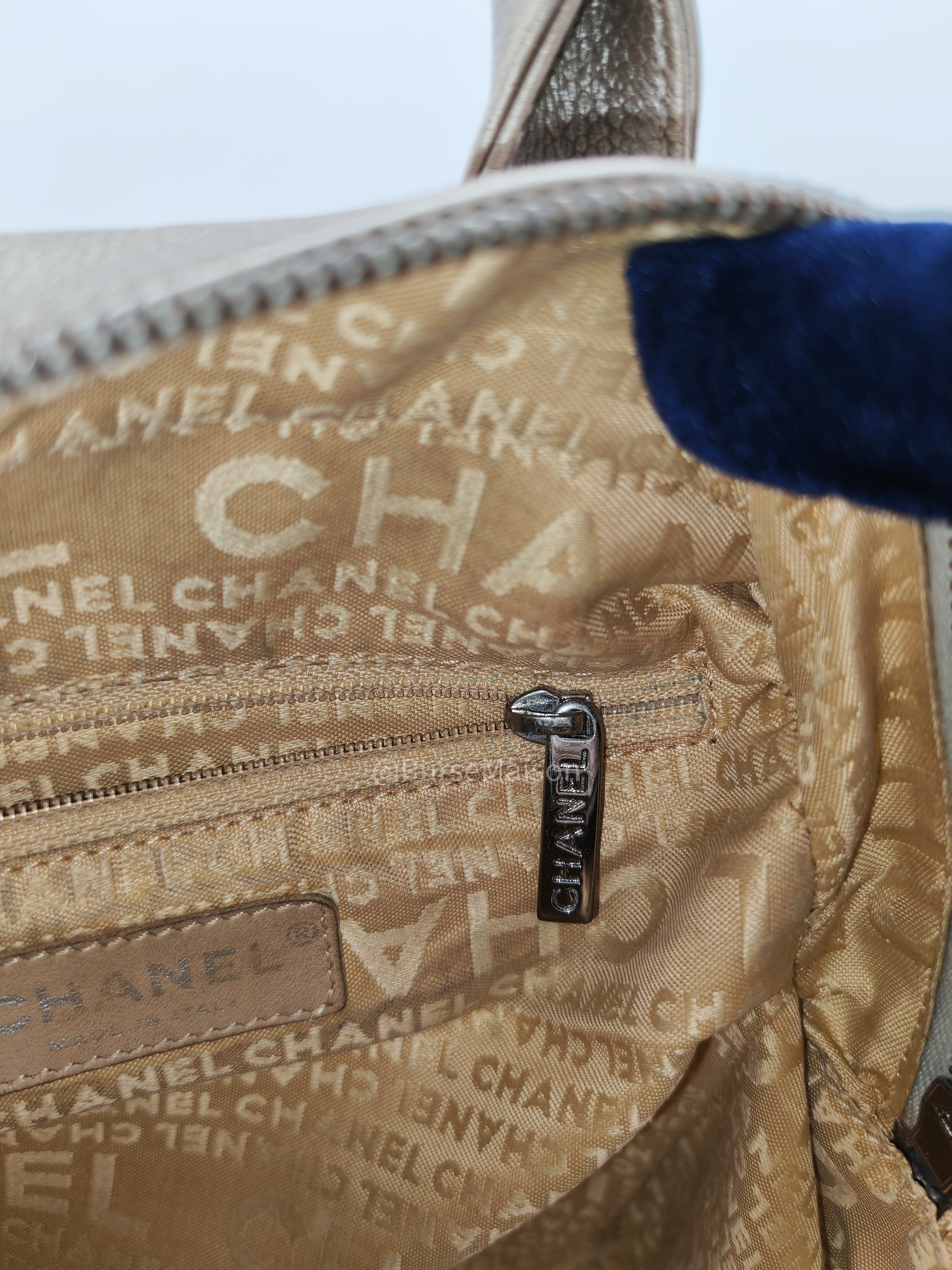 Chanel Tassel Top Handle Bag in Metallic Quilted Caviar Leather Silver Hardware (Series 9)