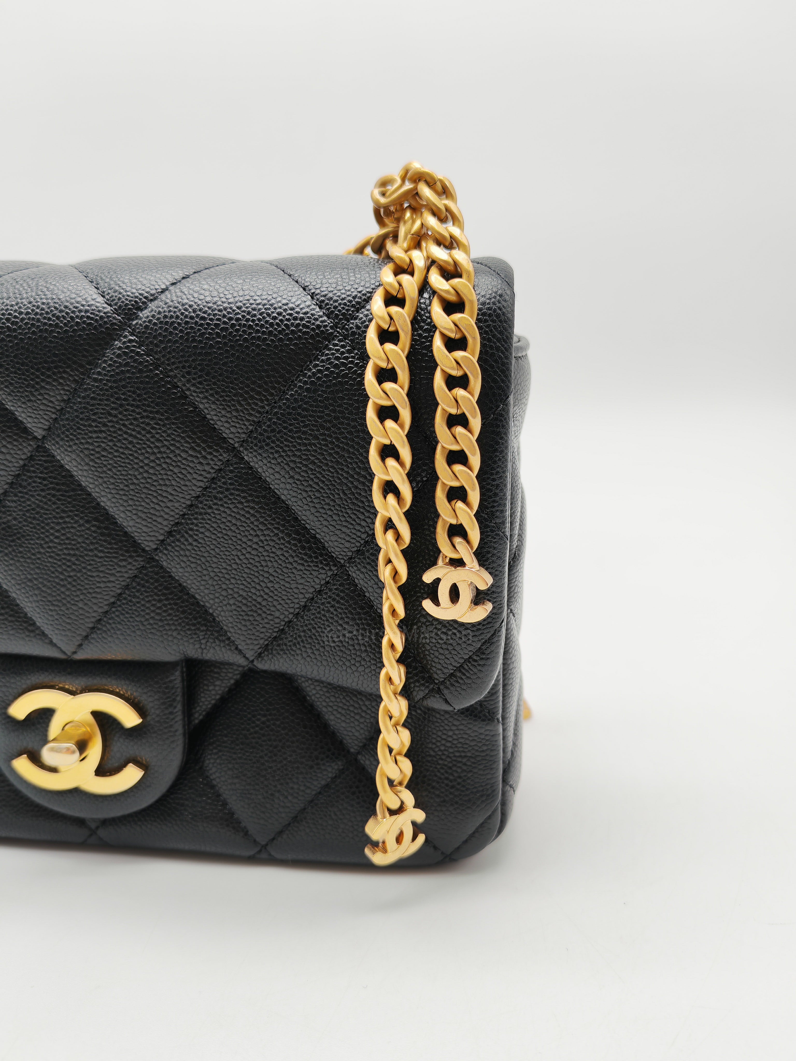 Chanel Mini Rectangular Flap Bag in Black Quilted Caviar Leather and Aged Gold Hardware Microchip