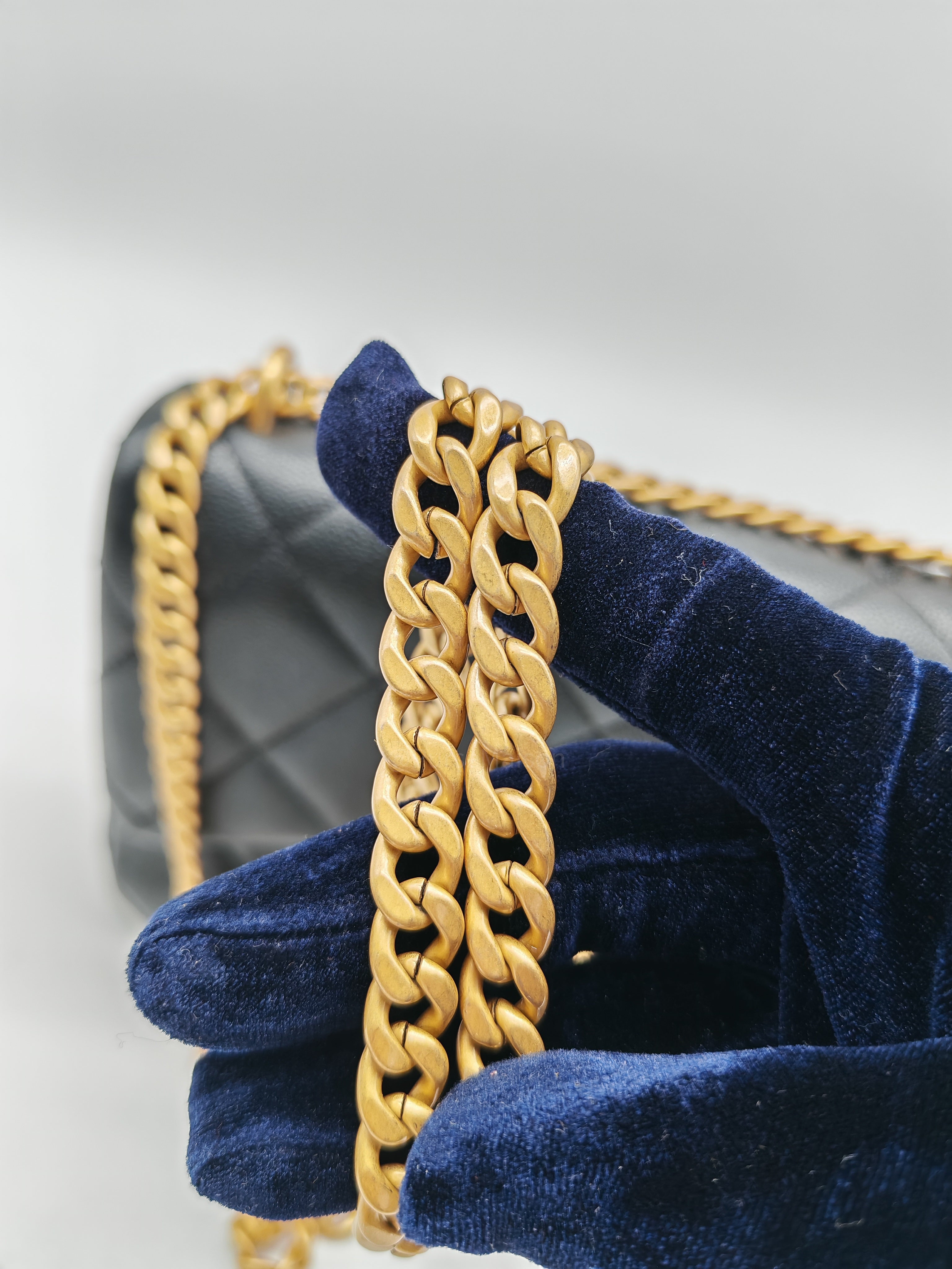 Chanel Mini Rectangular Flap Bag in Black Quilted Caviar Leather and Aged Gold Hardware Microchip