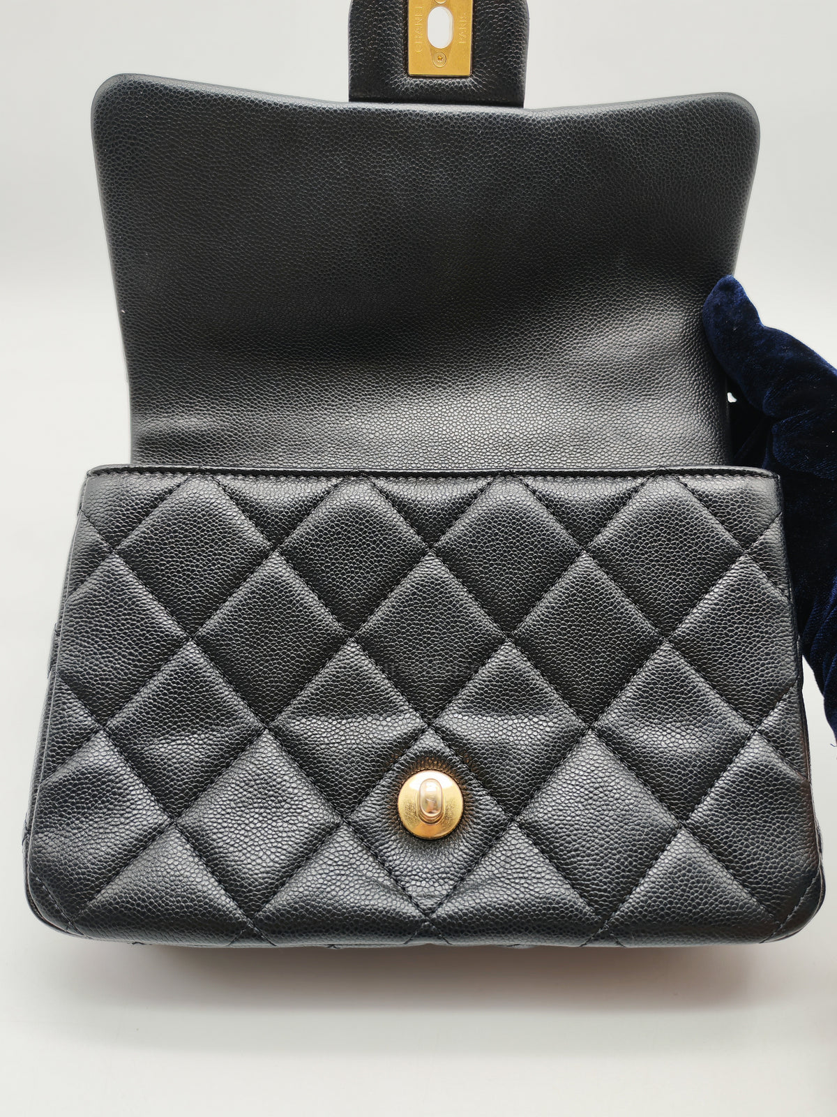 Chanel Mini Rectangular Flap Bag in Black Quilted Caviar Leather and Aged Gold Hardware Microchip