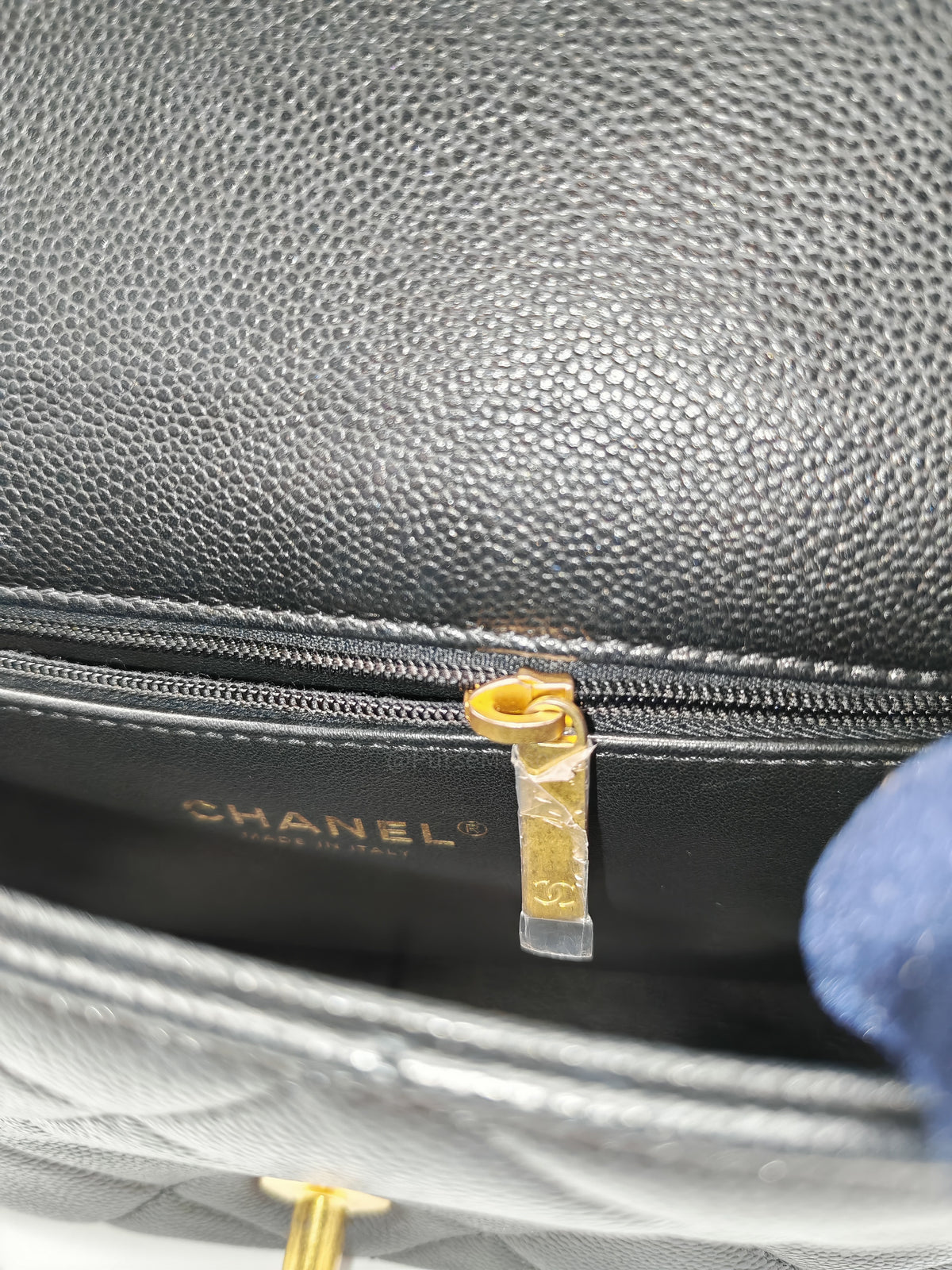 Chanel Mini Rectangular Flap Bag in Black Quilted Caviar Leather and Aged Gold Hardware Microchip