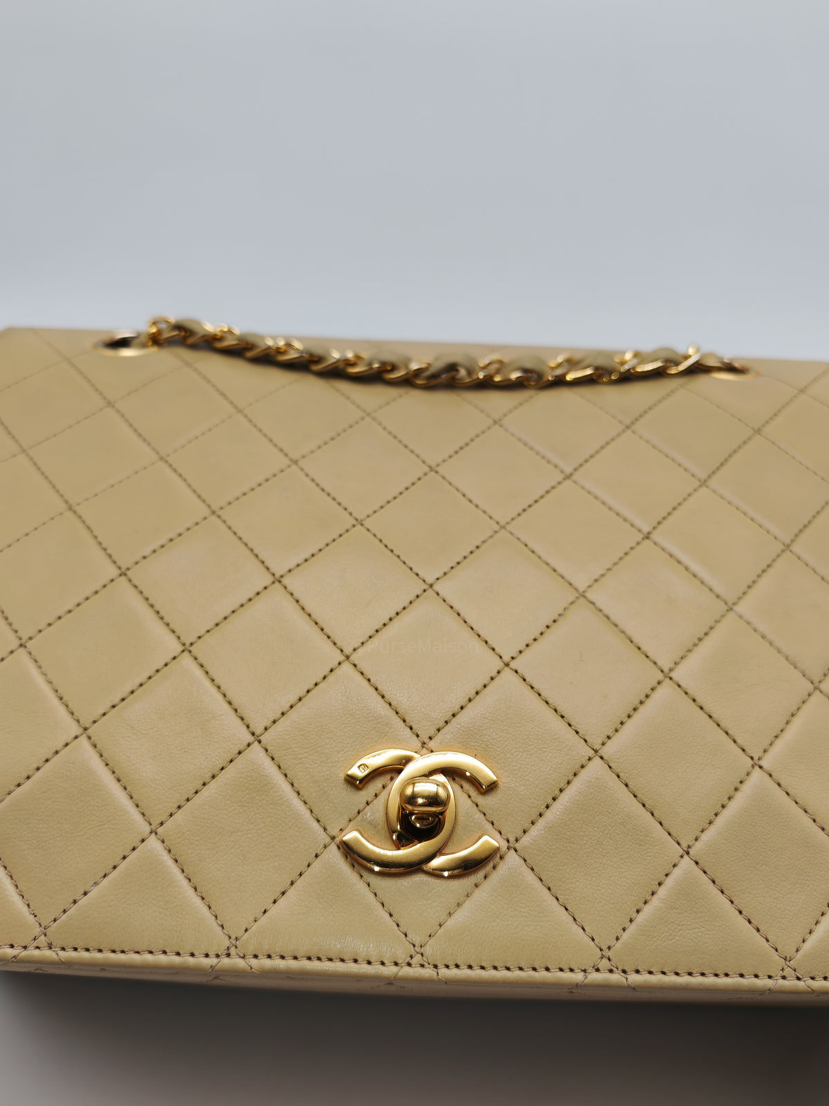 Chanel Vintage Timeless Classic Flap Bag in Beige Quilted Lambskin Leather and Gold Hardware Series 1