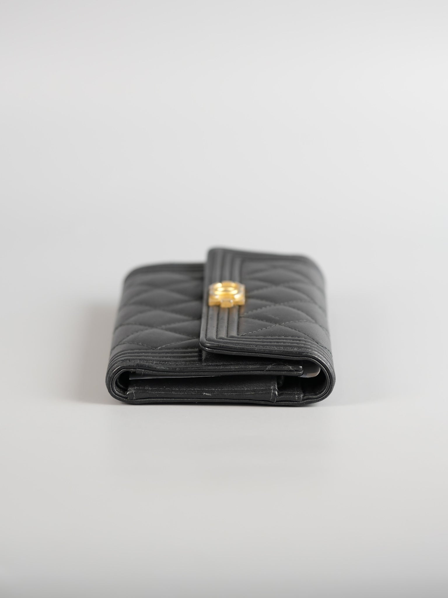 Boy Tri-fold Wallet in Black Quilted Lambskin Leather & Aged Gold Hardware Series 24