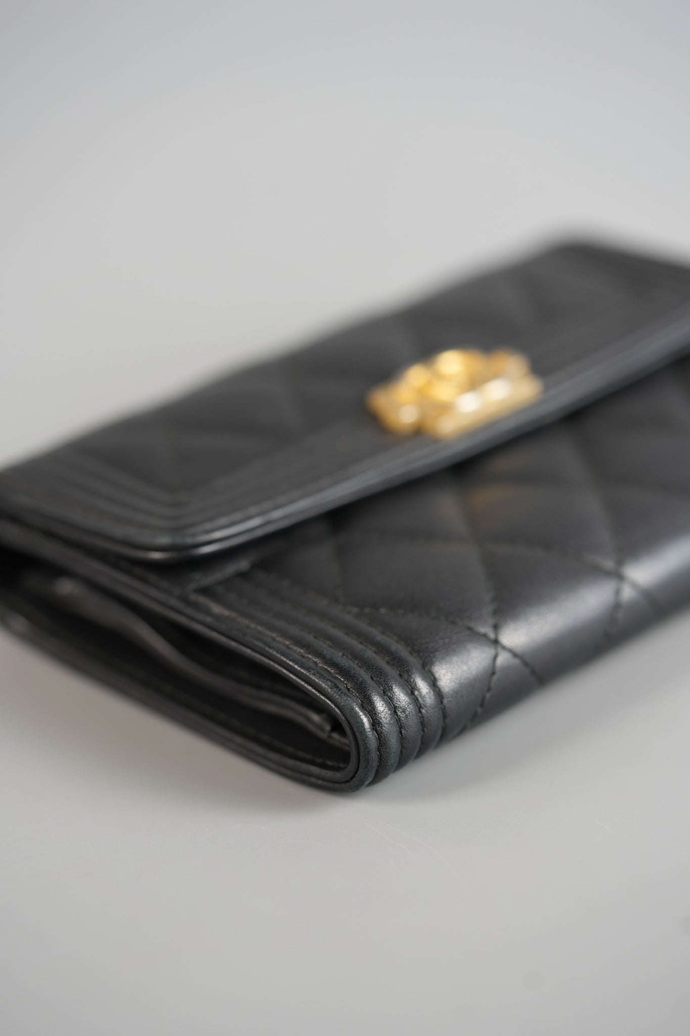 Boy Tri-fold Wallet in Black Quilted Lambskin Leather & Aged Gold Hardware Series 24