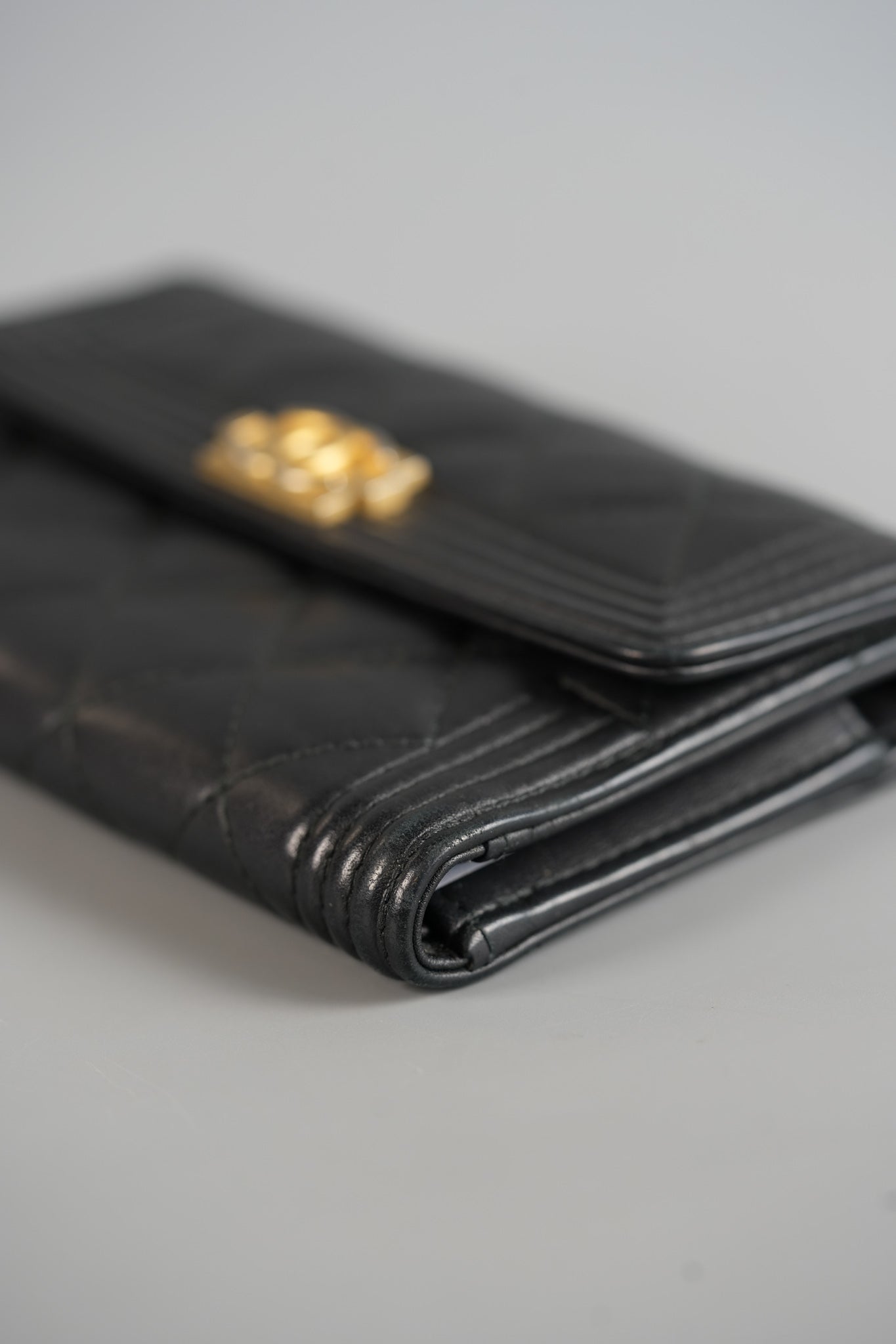 Boy Tri-fold Wallet in Black Quilted Lambskin Leather & Aged Gold Hardware Series 24