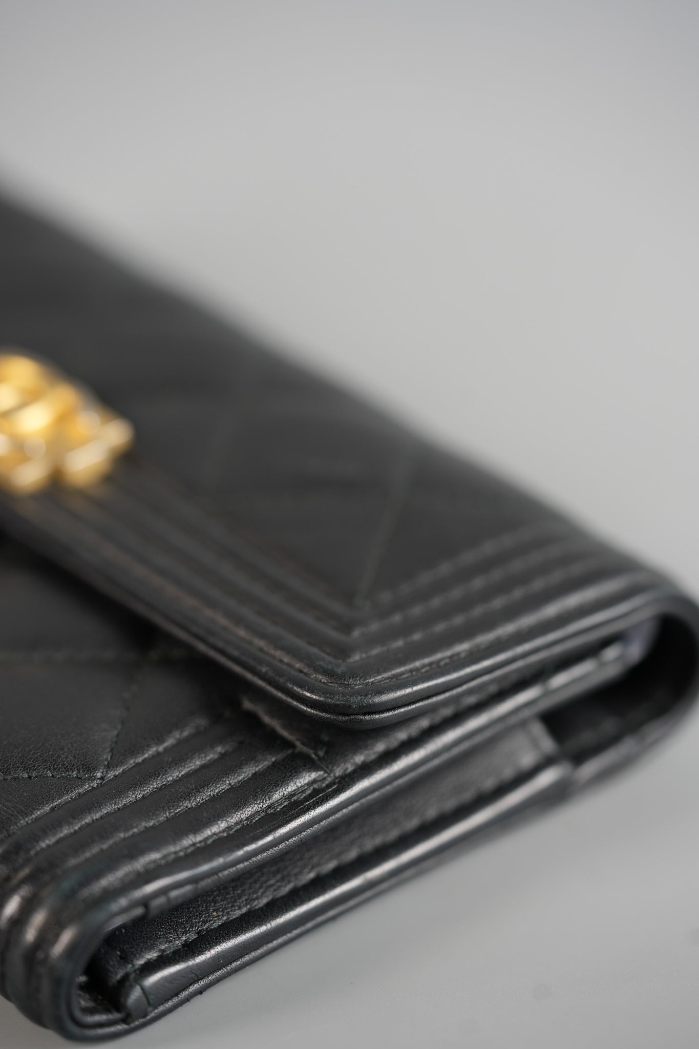 Boy Tri-fold Wallet in Black Quilted Lambskin Leather & Aged Gold Hardware Series 24