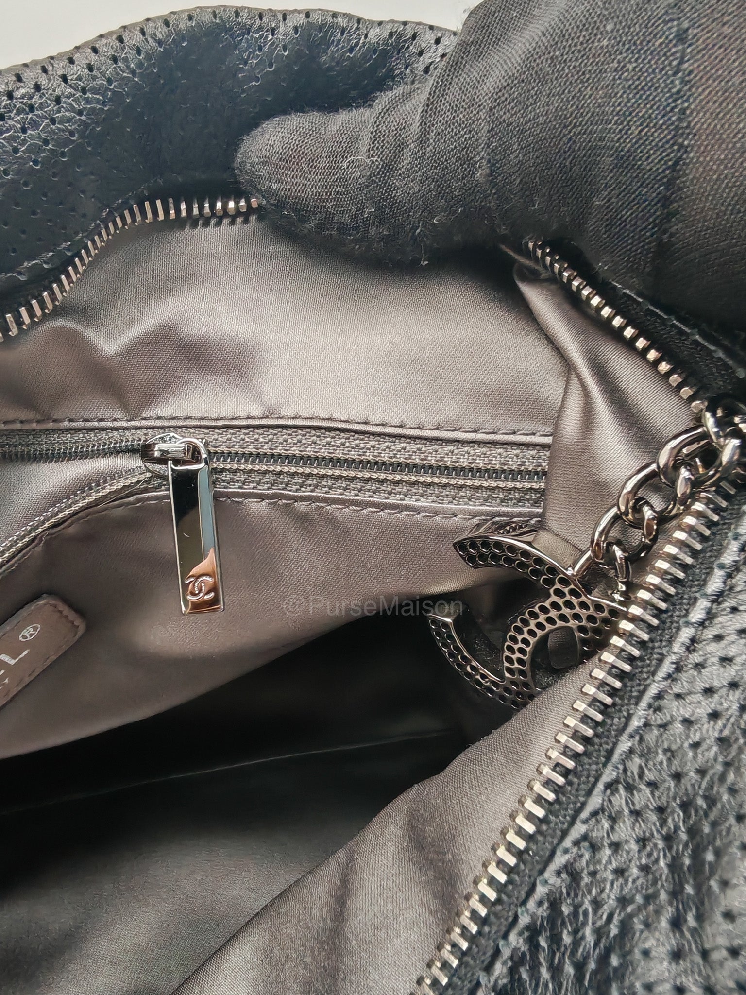 Chanel Perforated Ultimate Soft Hobo Bag in Black and Silver Hardware Series 12