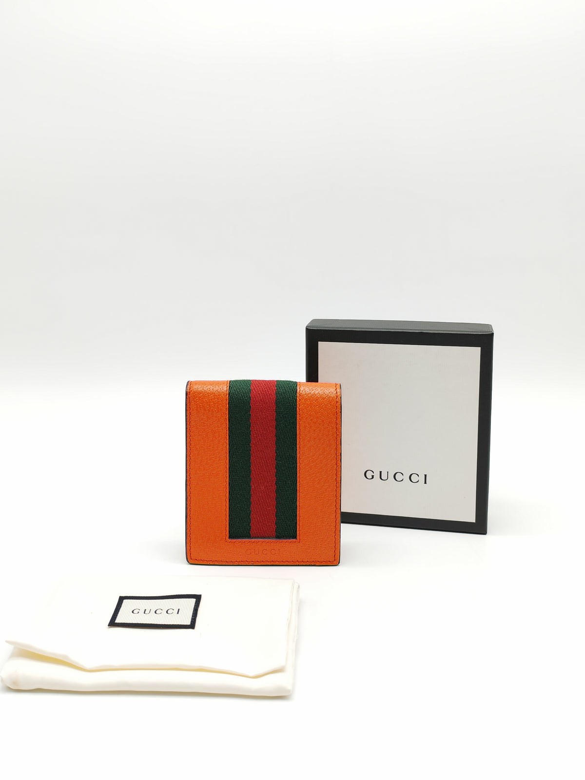 Gucci Bi-Fold Wallet in Orange Leather Signature Web