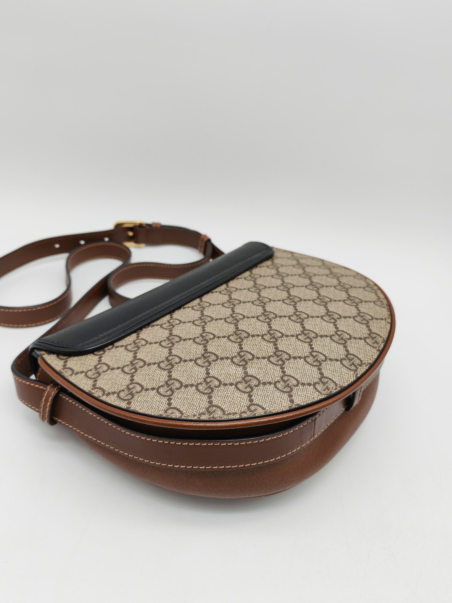 Gucci Padlock Saddle Bag in GG Supreme Monogram Canvas and Gold Hardware