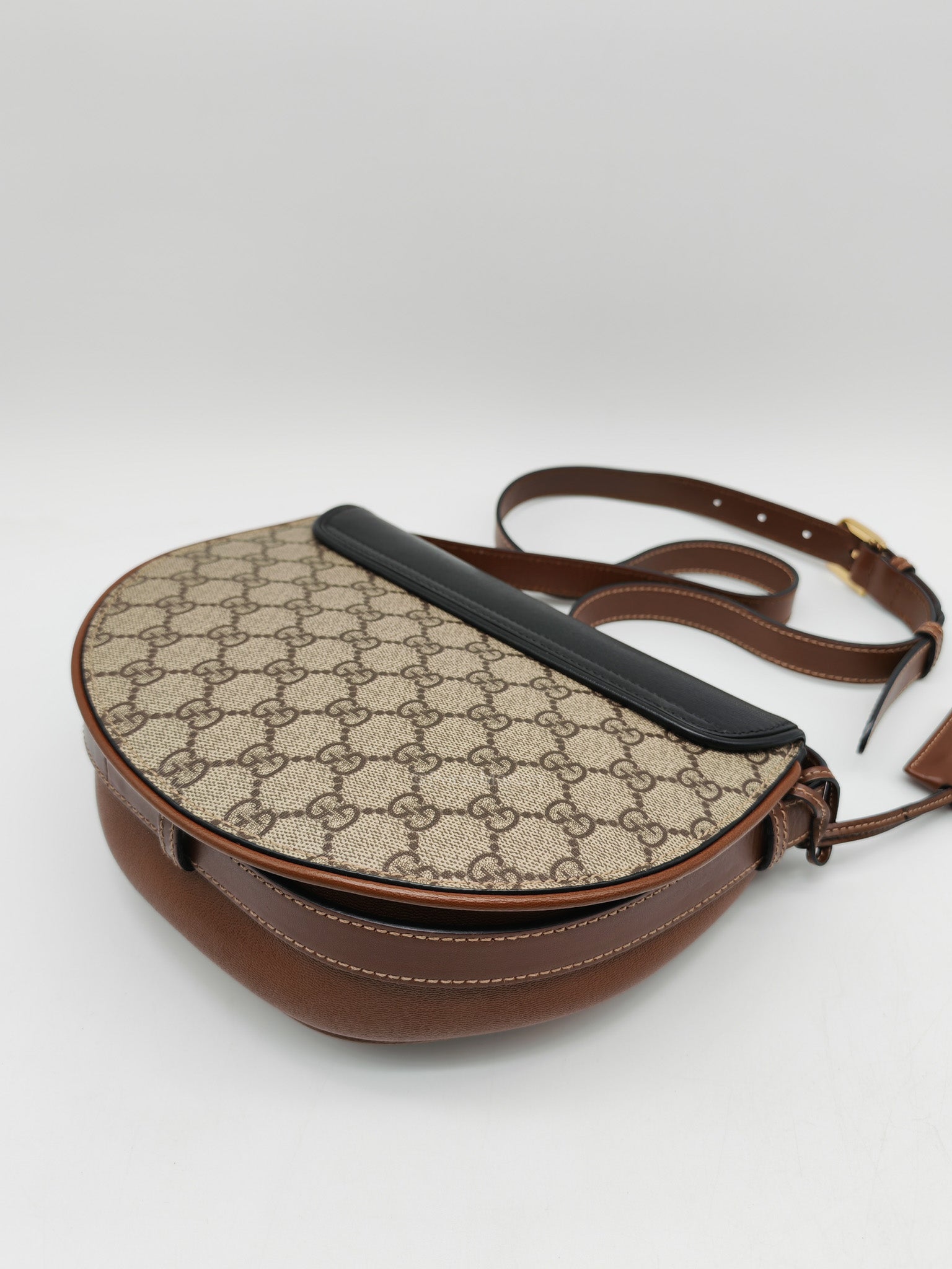 Gucci Padlock Saddle Bag in GG Supreme Monogram Canvas and Gold Hardware