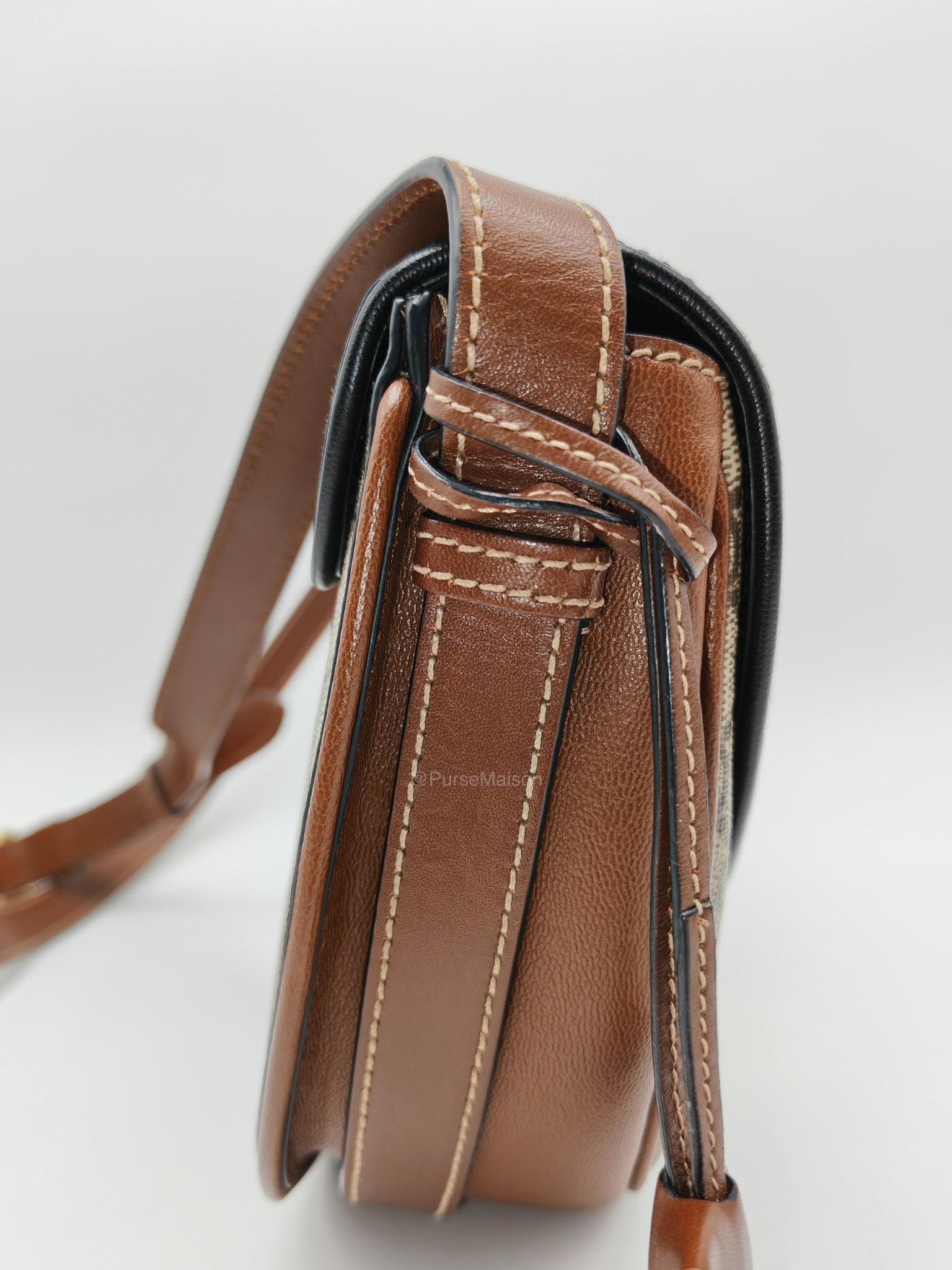 Gucci Padlock Saddle Bag in GG Supreme Monogram Canvas and Gold Hardware