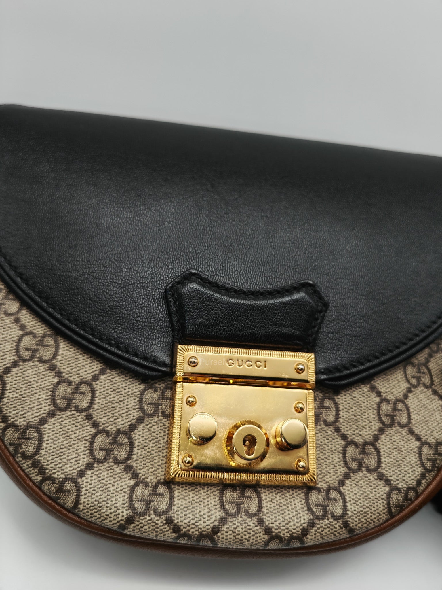 Gucci Padlock Saddle Bag in GG Supreme Monogram Canvas and Gold Hardware