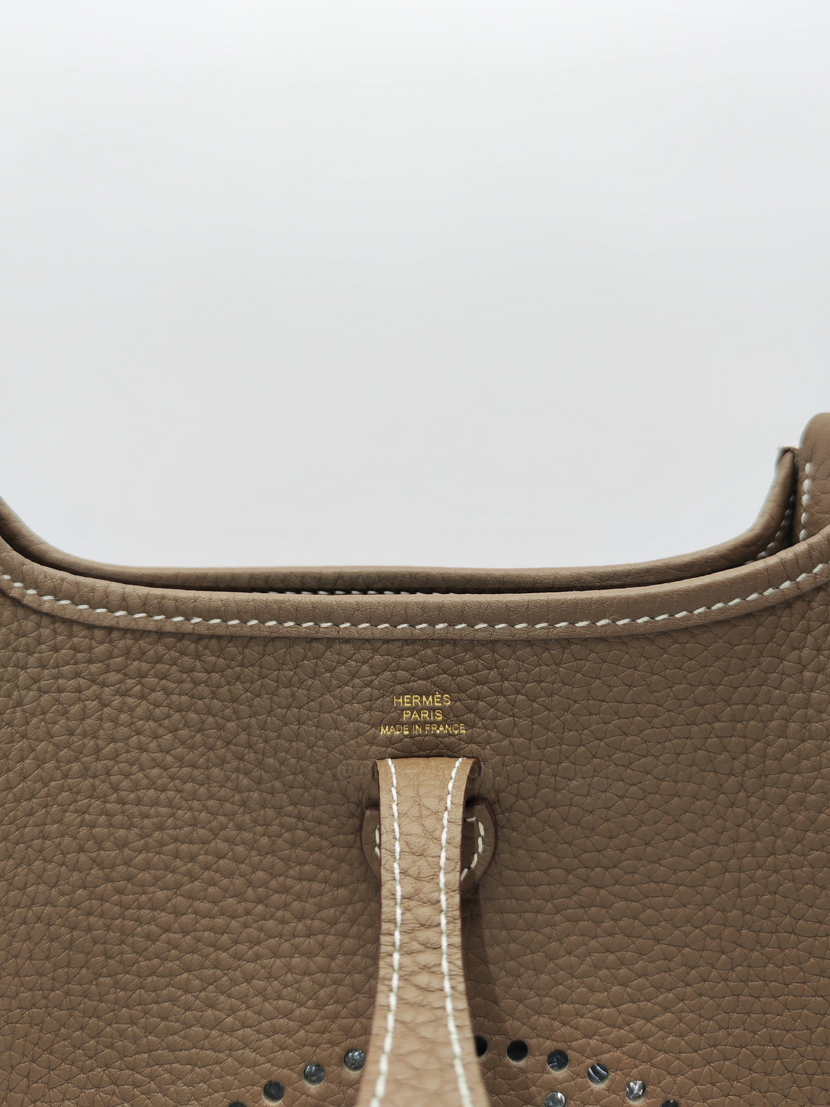Hermes Mini Evelyne TPM in Etoupe Clemence Leather with Navy Blue Strap Palladium Hardware Stamp K(2025)