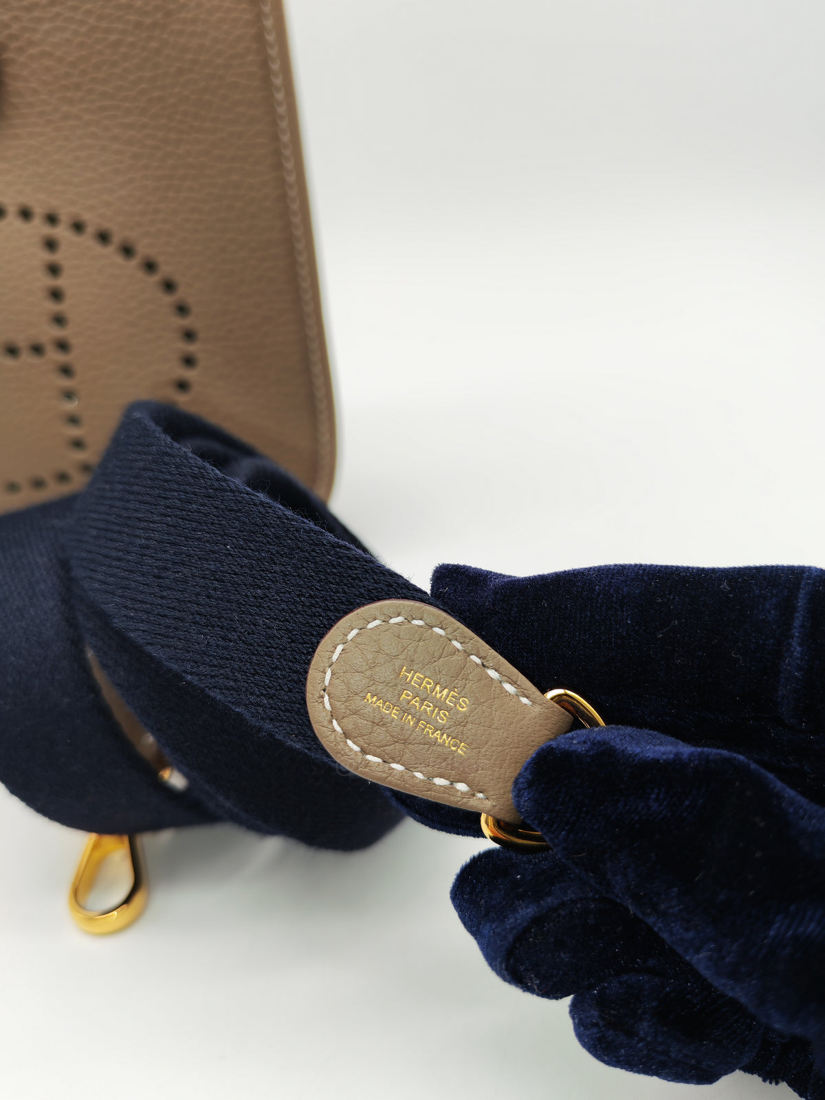 Hermes Mini Evelyne TPM in Etoupe Clemence Leather with Navy Blue Strap Palladium Hardware Stamp K(2025)