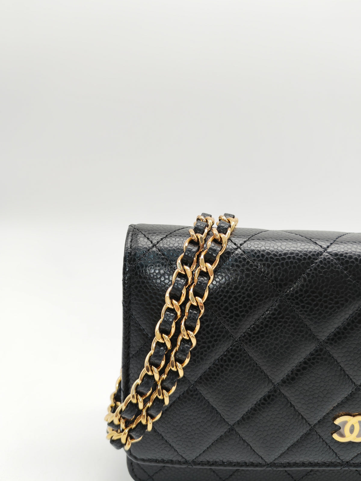 Chanel Classic Wallet On Chain (WOC) in Black Caviar Leather and Gold Hardware Microchip (2024)