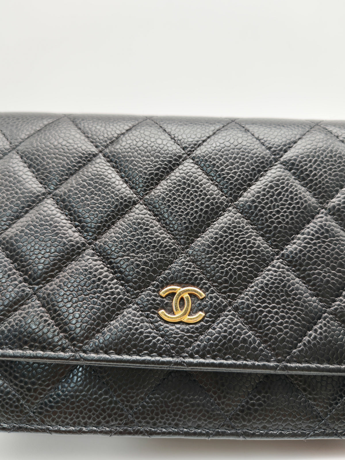 Chanel Classic Wallet On Chain (WOC) in Black Quilted Caviar Leather and Gold Hardware Series 29