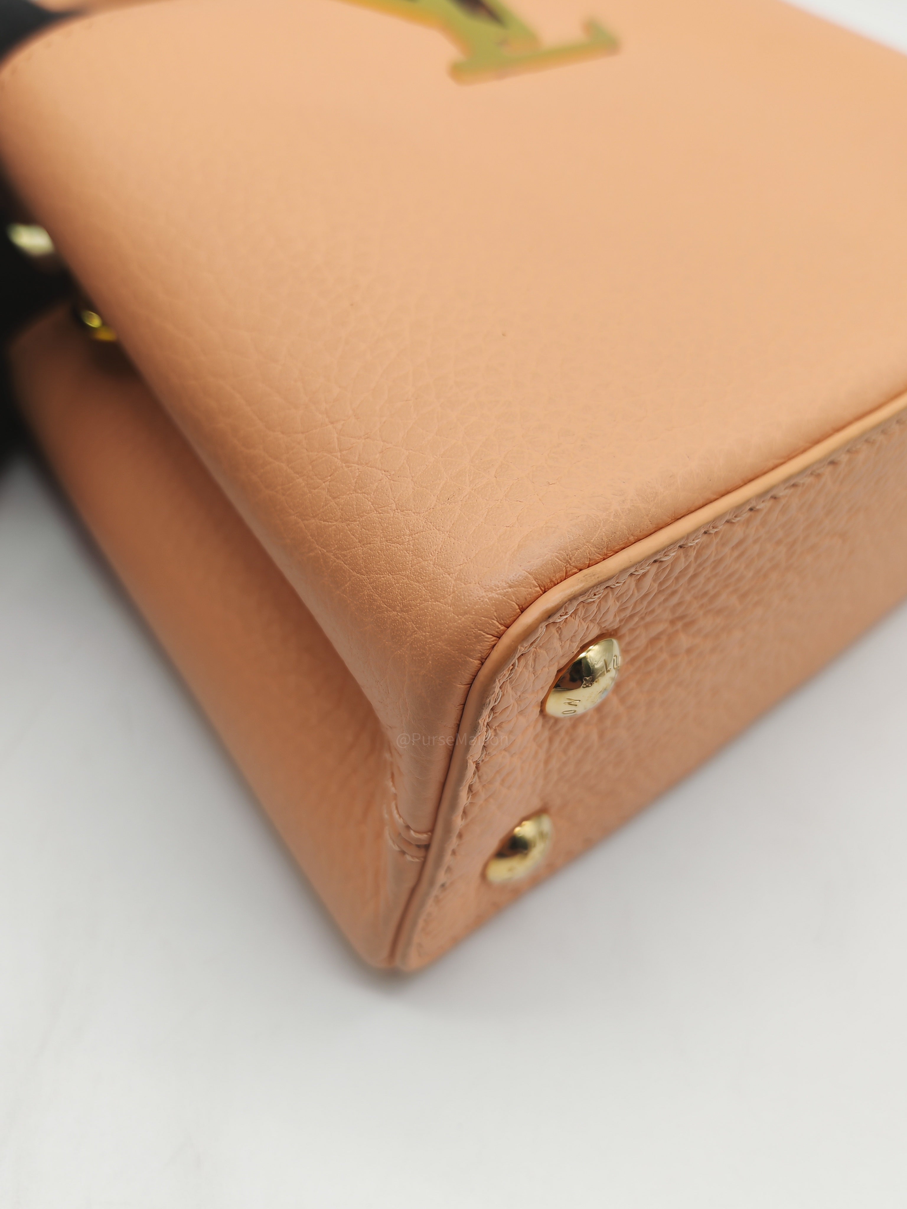 Louis Vuitton Capucines Mini Handbag in Peach Taurillon Leather and Iridescent Rainbow Hardware Microchip
