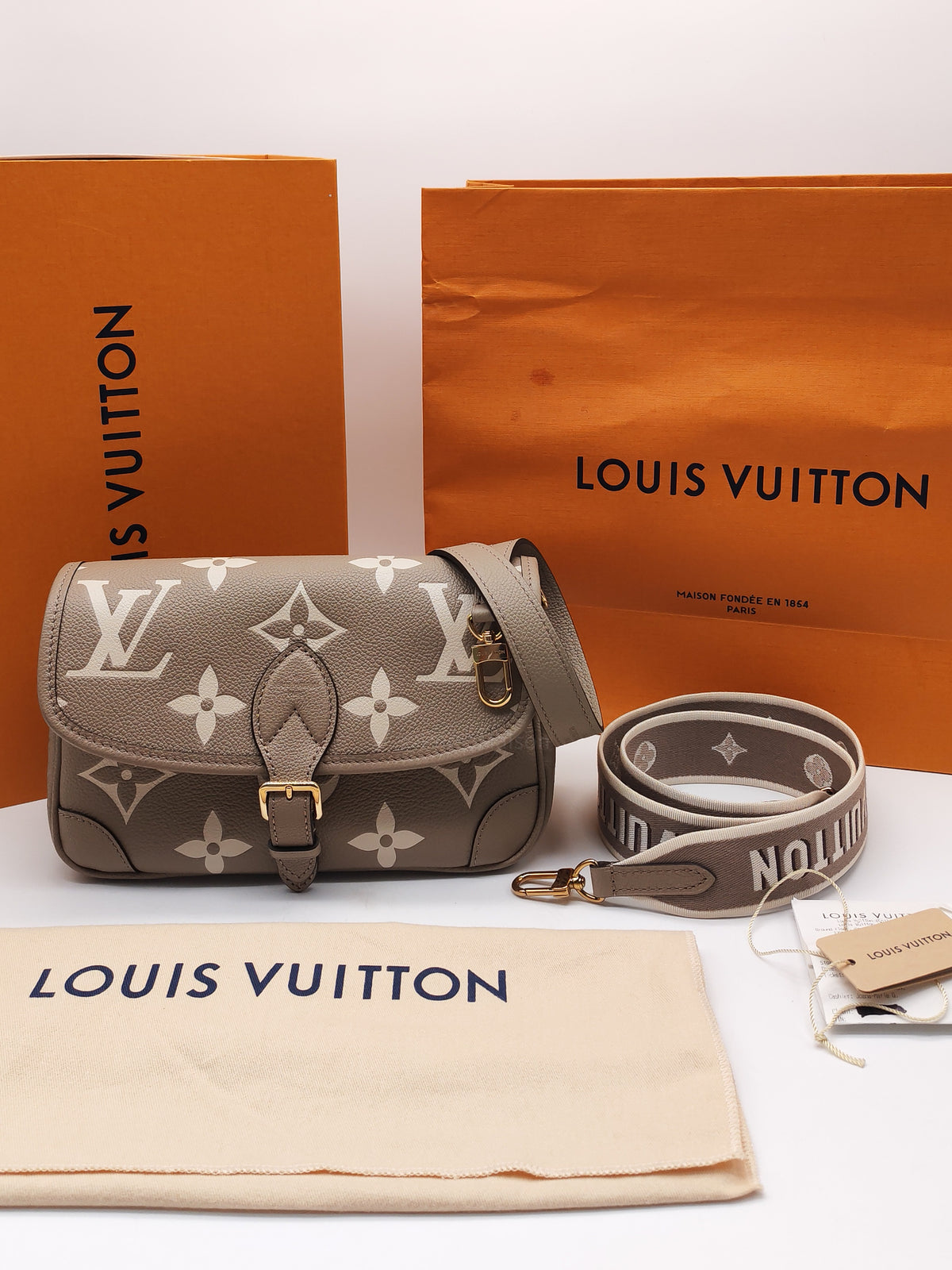 Louis Vuitton Diane PM in Beige Monogram Empreinte Leather and Gold Hardware Microchip