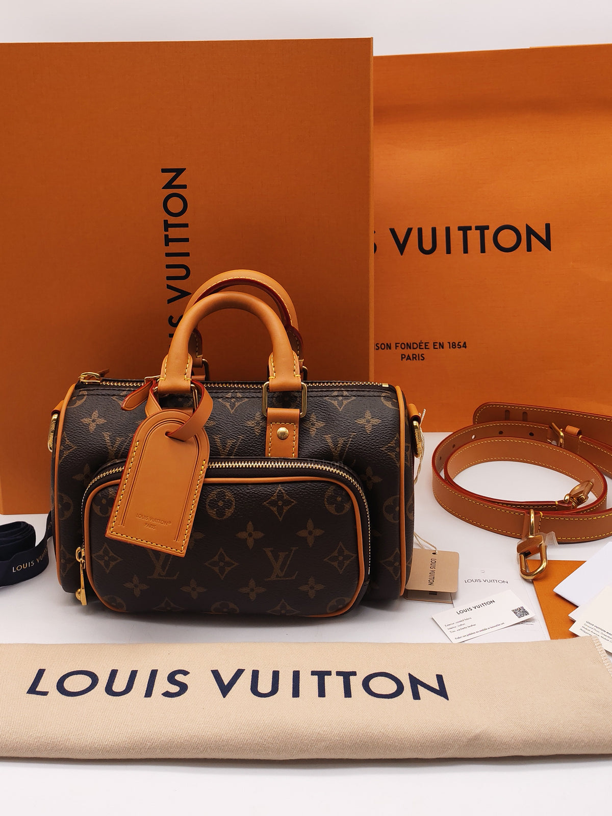 Louis Vuitton Keepall Bandouliere 25 in Monogram Canvas Top Handle Bag (Microchip)