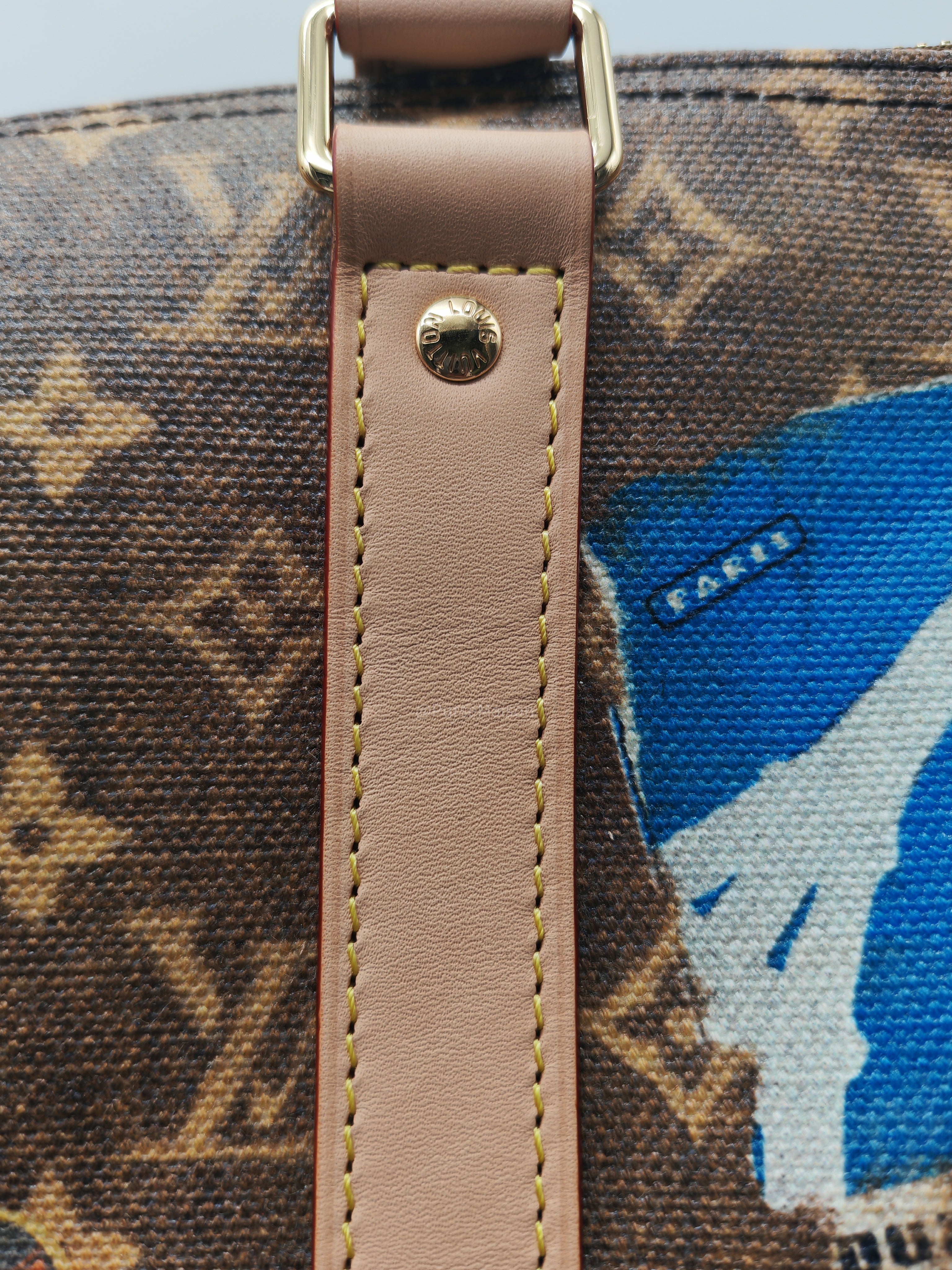 Louis Vuitton Keepall Bandouliere Flight Mode Collection in Monogram Canvas Cowhide Leather and Gold Hardware Microchip
