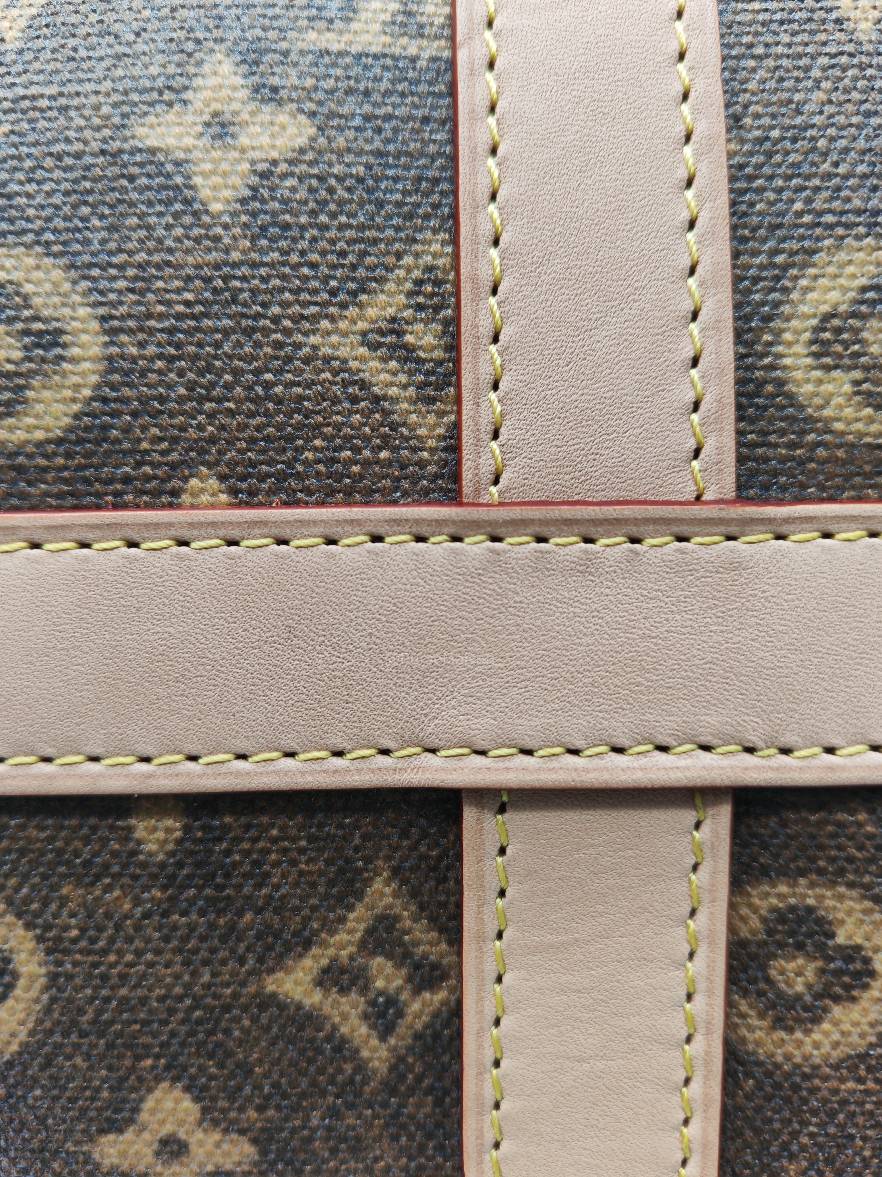 Louis Vuitton Keepall Bandouliere Flight Mode Collection in Monogram Canvas Cowhide Leather and Gold Hardware Microchip