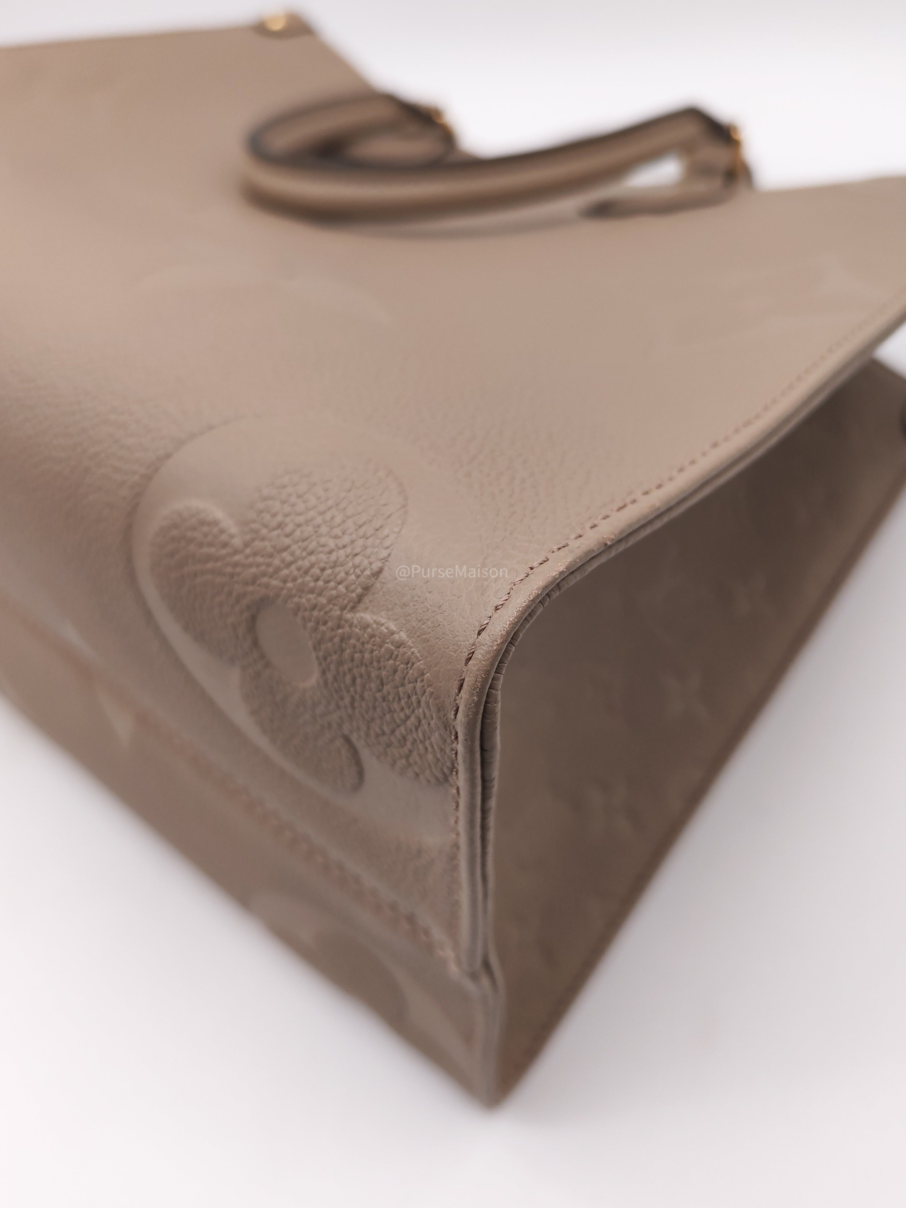 Louis Vuitton OnTheGo Tote Bag MM in Tourtorelle Monogram Empreinte Leather(Microchip)