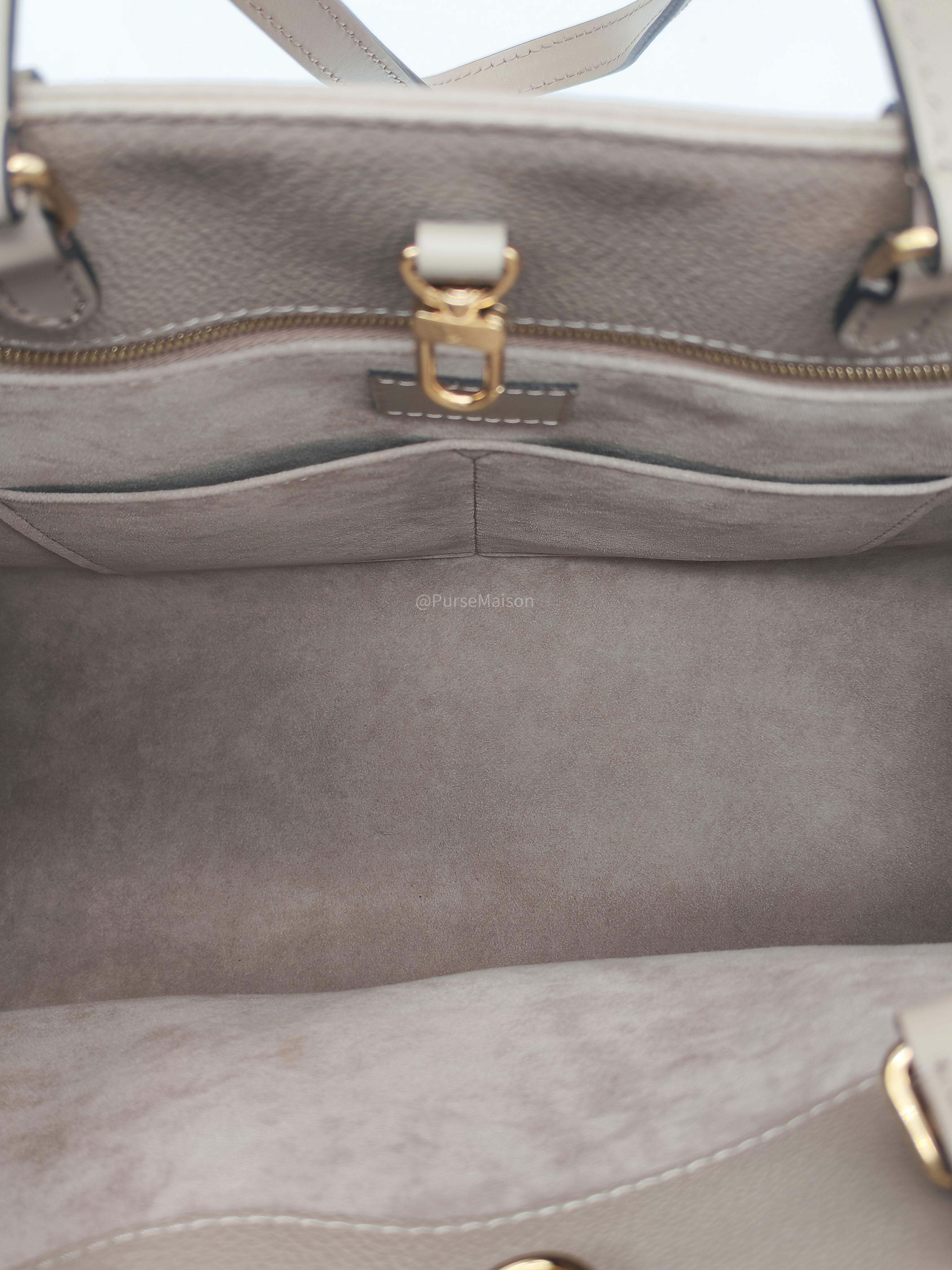 Louis Vuitton OnTheGo Tote Bag MM in Tourtorelle Monogram Empreinte Leather(Microchip)