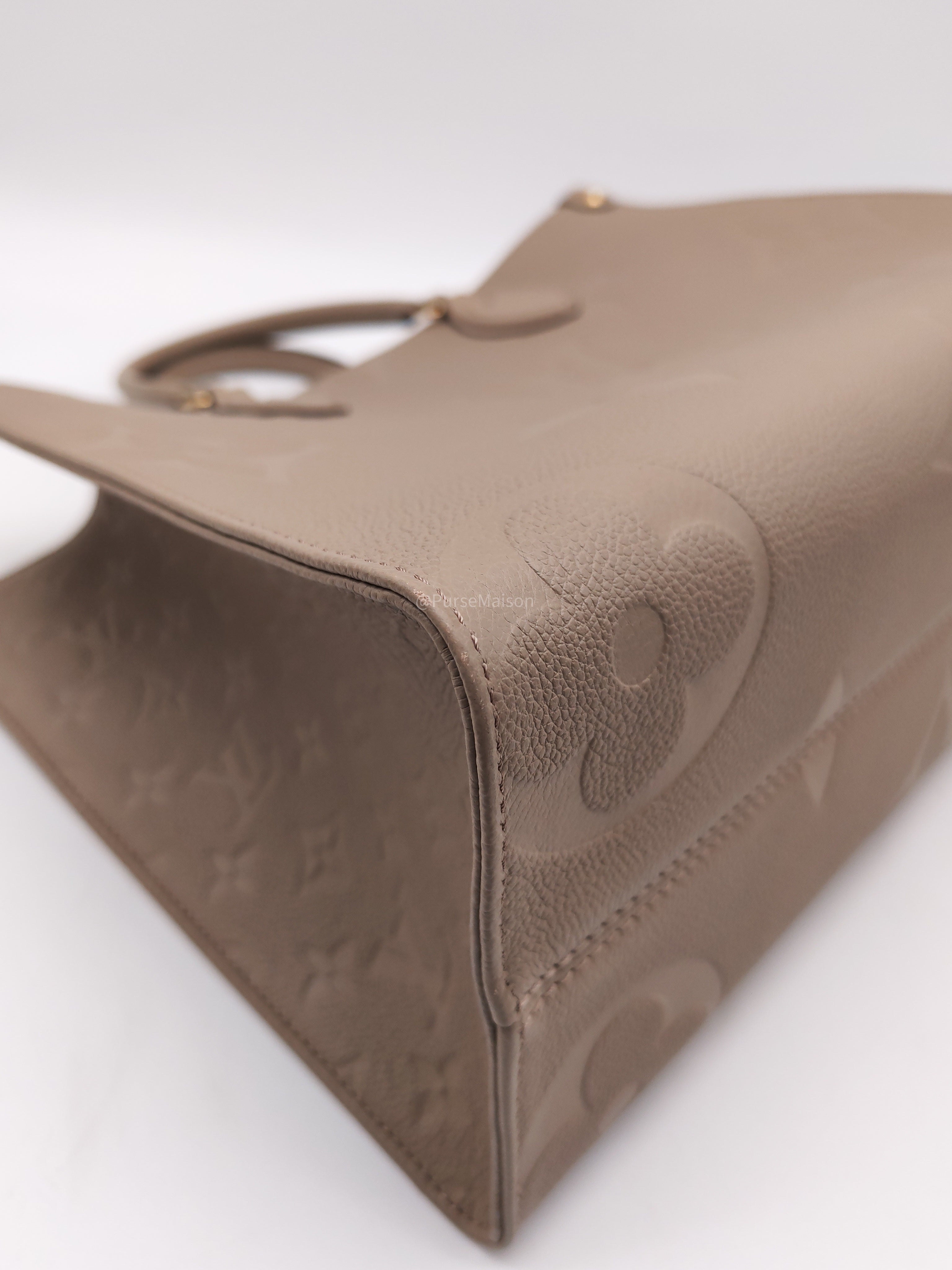 Louis Vuitton OnTheGo Tote Bag MM in Tourtorelle Monogram Empreinte Leather(Microchip)