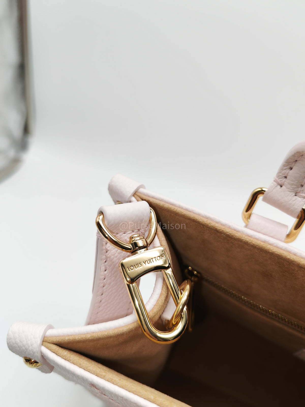 Louis Vuitton OnTheGo PM in Pale Pink Monogram Empreinte Couture Cowhide Leather and Gold Hardware Microchip