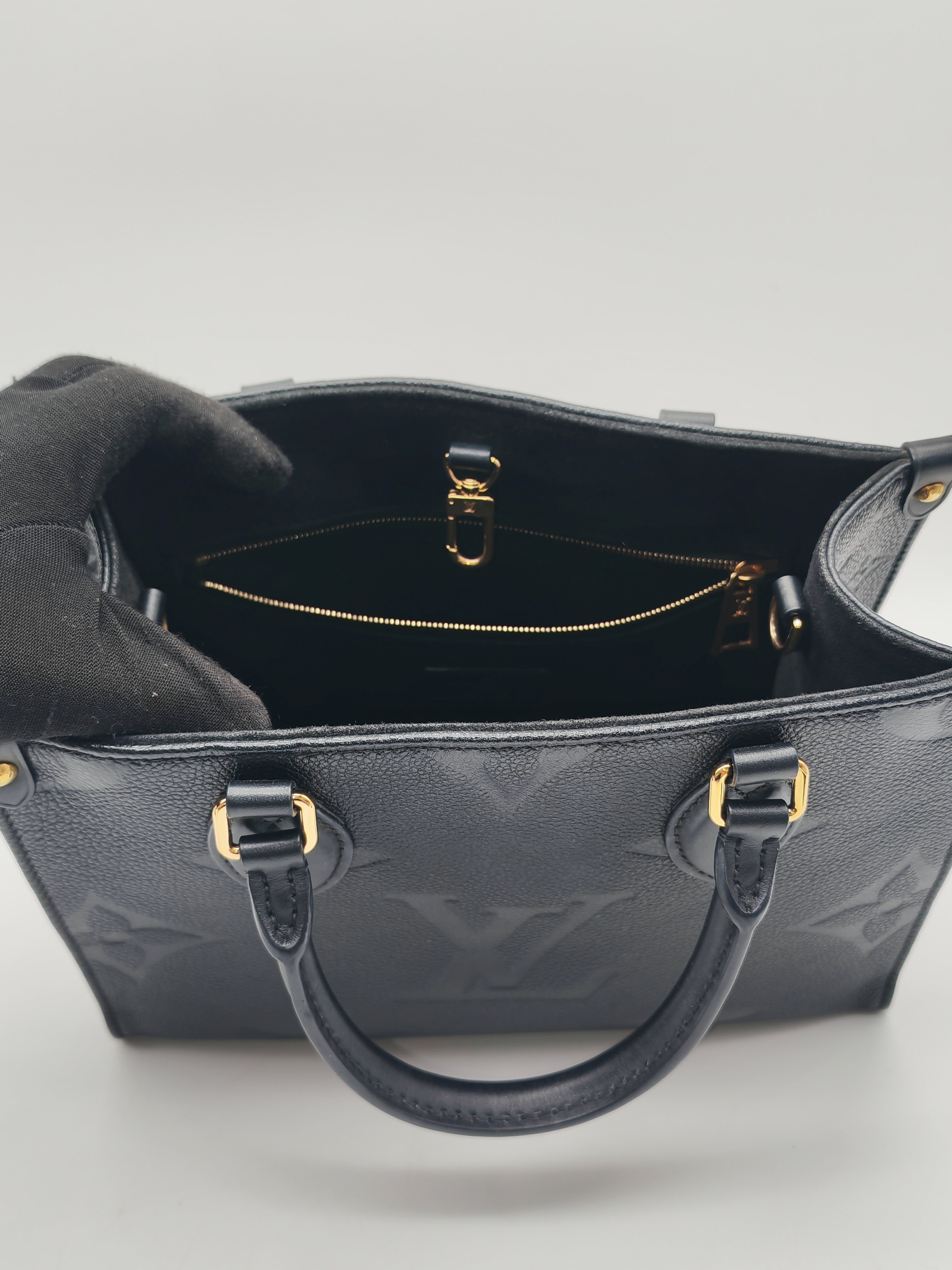 Louis Vuitton OntheGo MM In Black Monogram Empreinte Leather and Gold Hardware Microchip